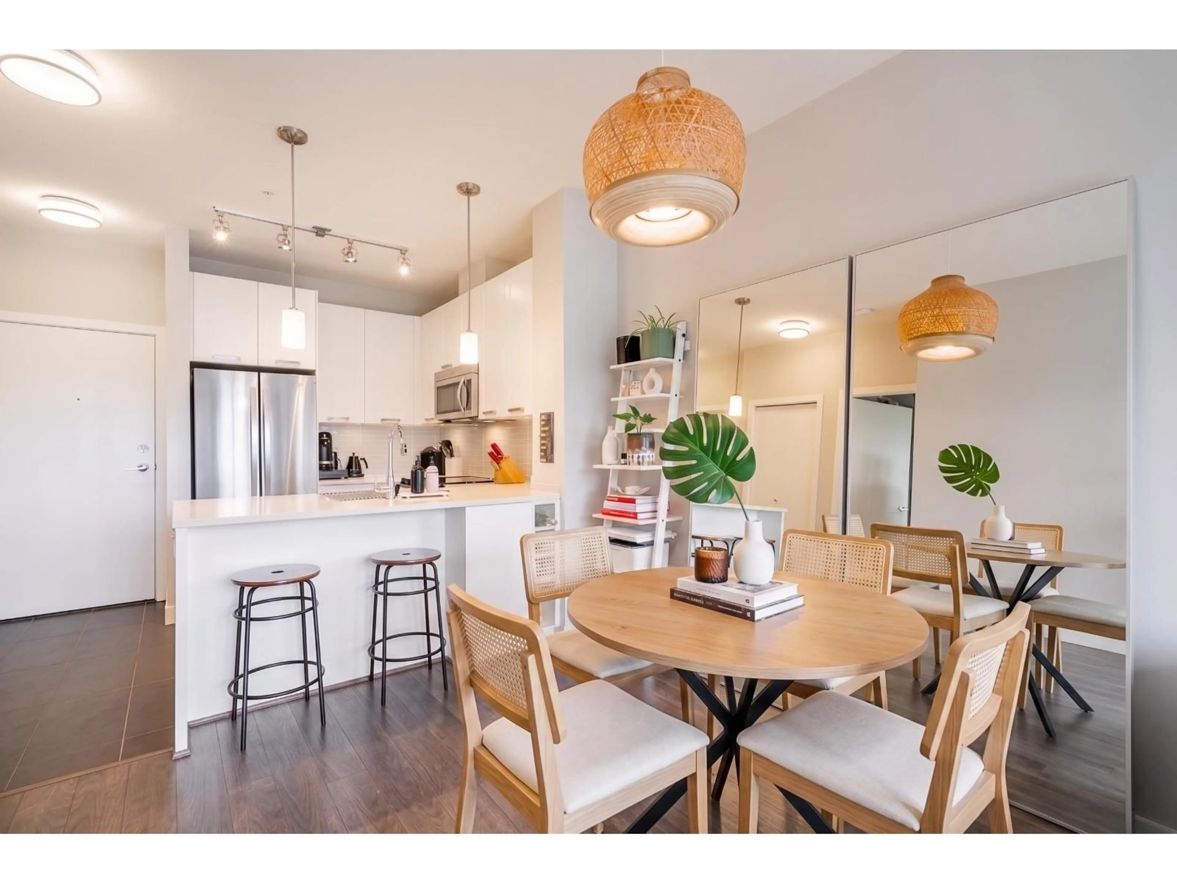 Open concept kitchen, wood/laminate floor for 405 - 15388 105 AVENUE, Surrey British Columbia V3R0C4
