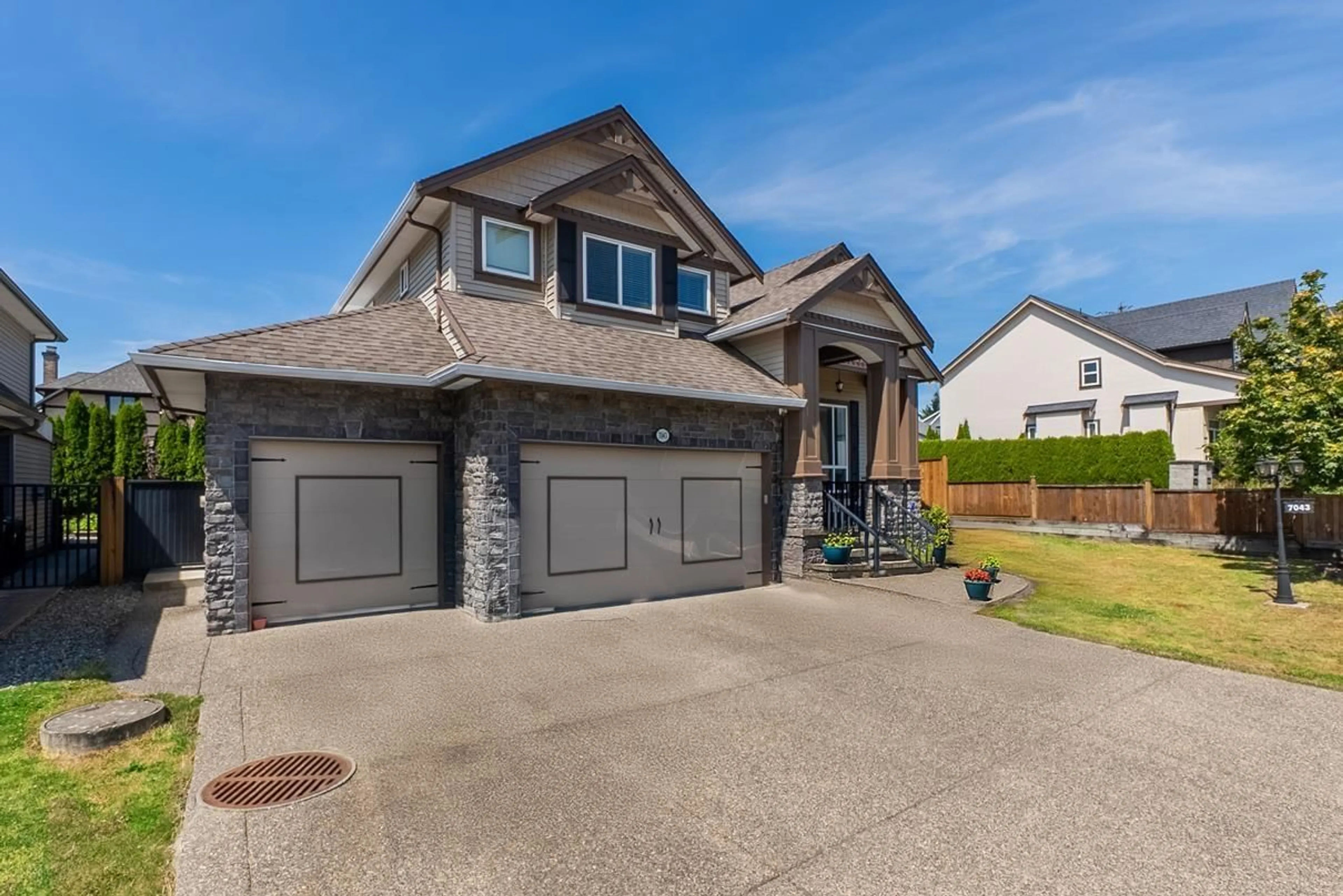 Home with vinyl exterior material, street for 7043 197B STREET, Langley British Columbia V2Y0E9