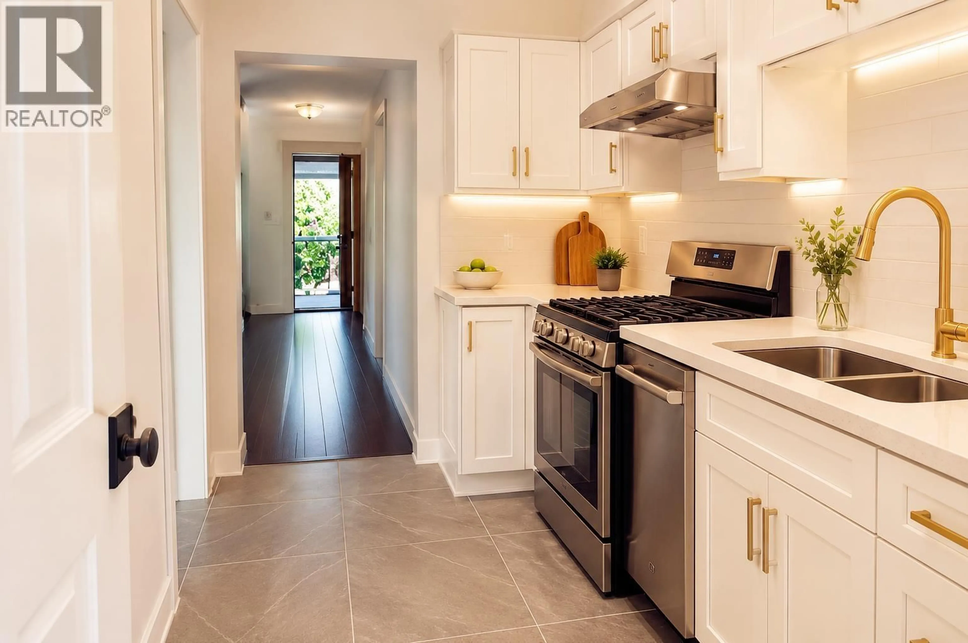 Open concept kitchen, ceramic/tile floor for 4313 MILLER STREET, Vancouver British Columbia V5N4A1