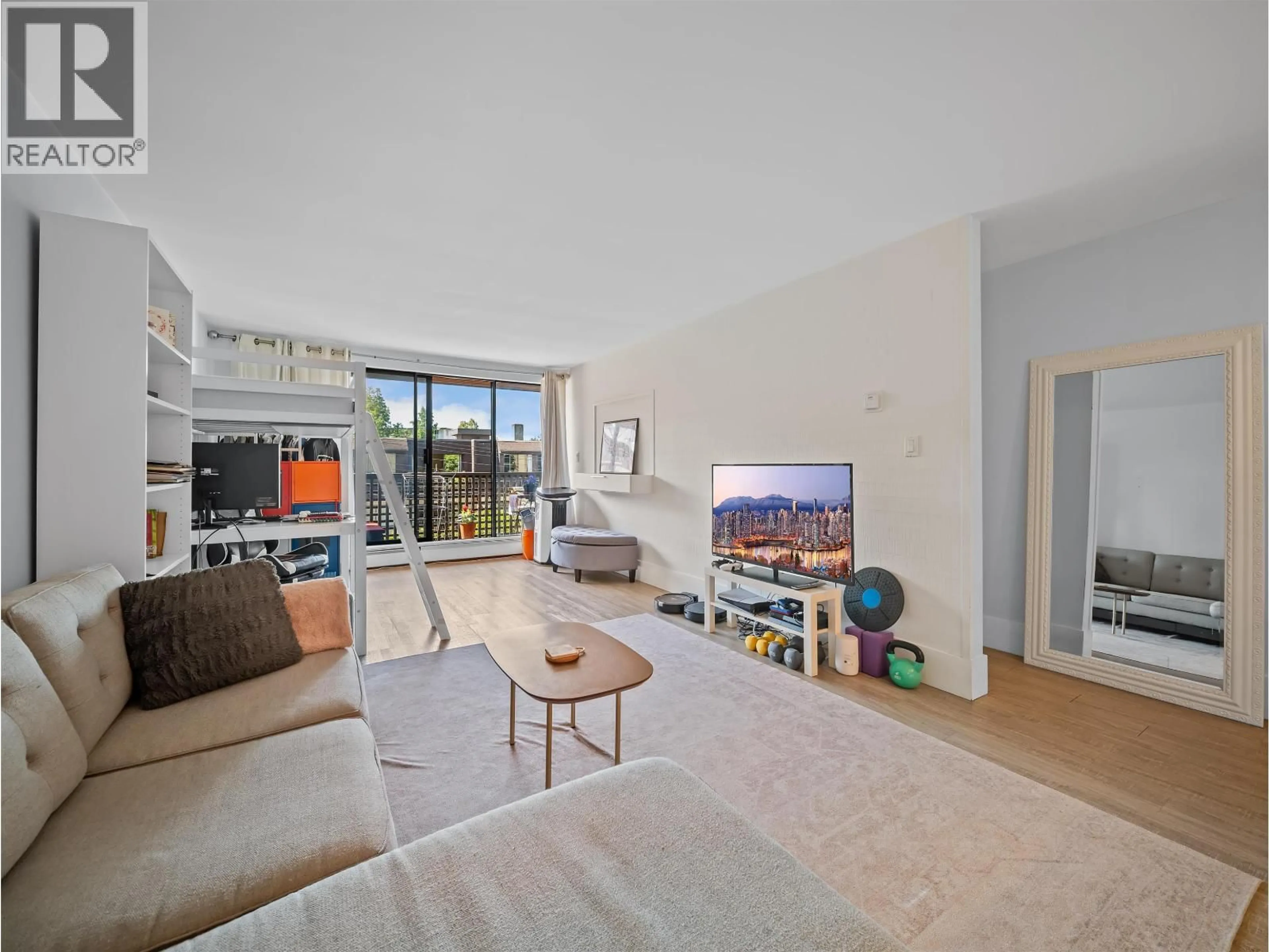 Living room with furniture, unknown for 210 - 141 13TH STREET, North Vancouver British Columbia V7M1N5