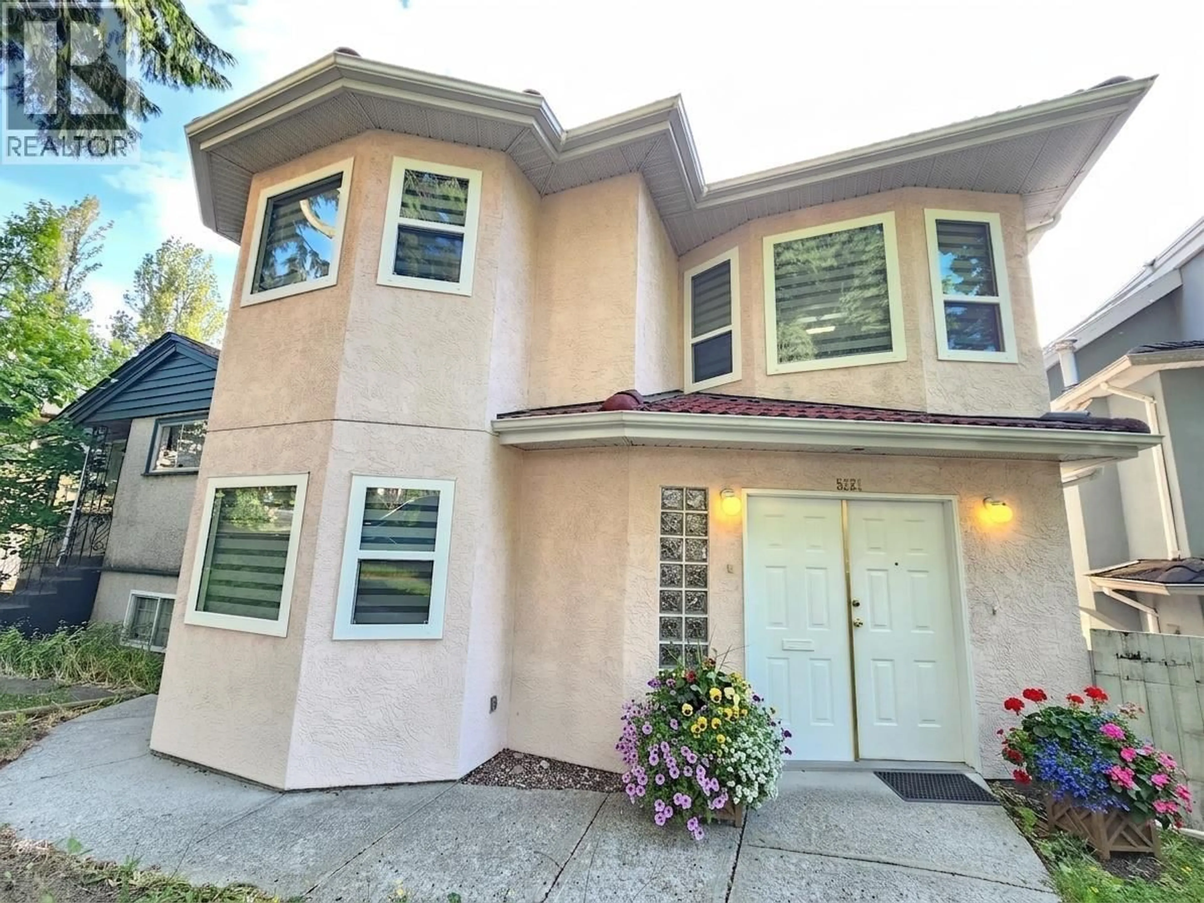 Home with vinyl exterior material, street for 5521 DUNDEE STREET, Vancouver British Columbia V5R3T8