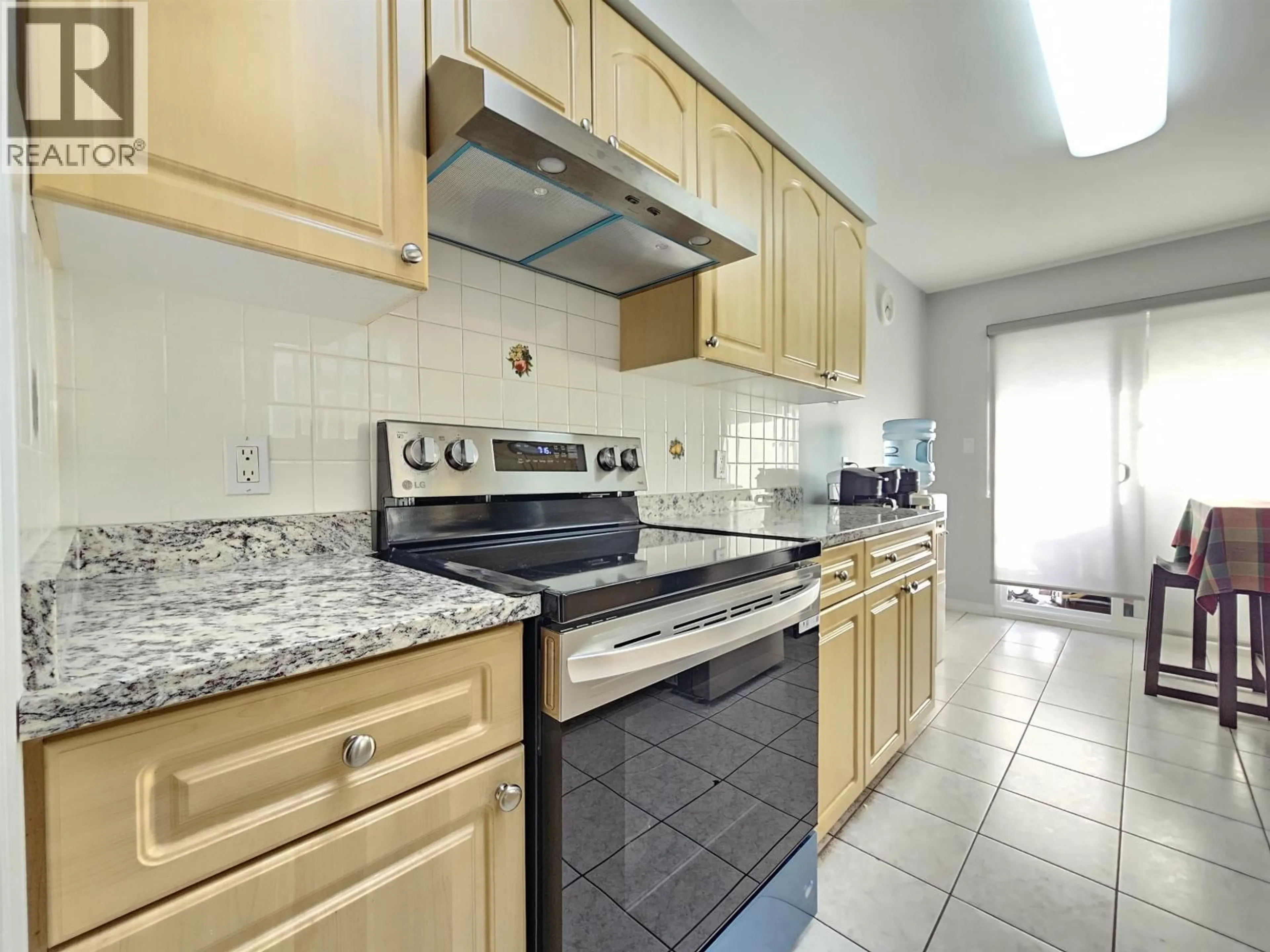 Standard kitchen, ceramic/tile floor for 5521 DUNDEE STREET, Vancouver British Columbia V5R3T8