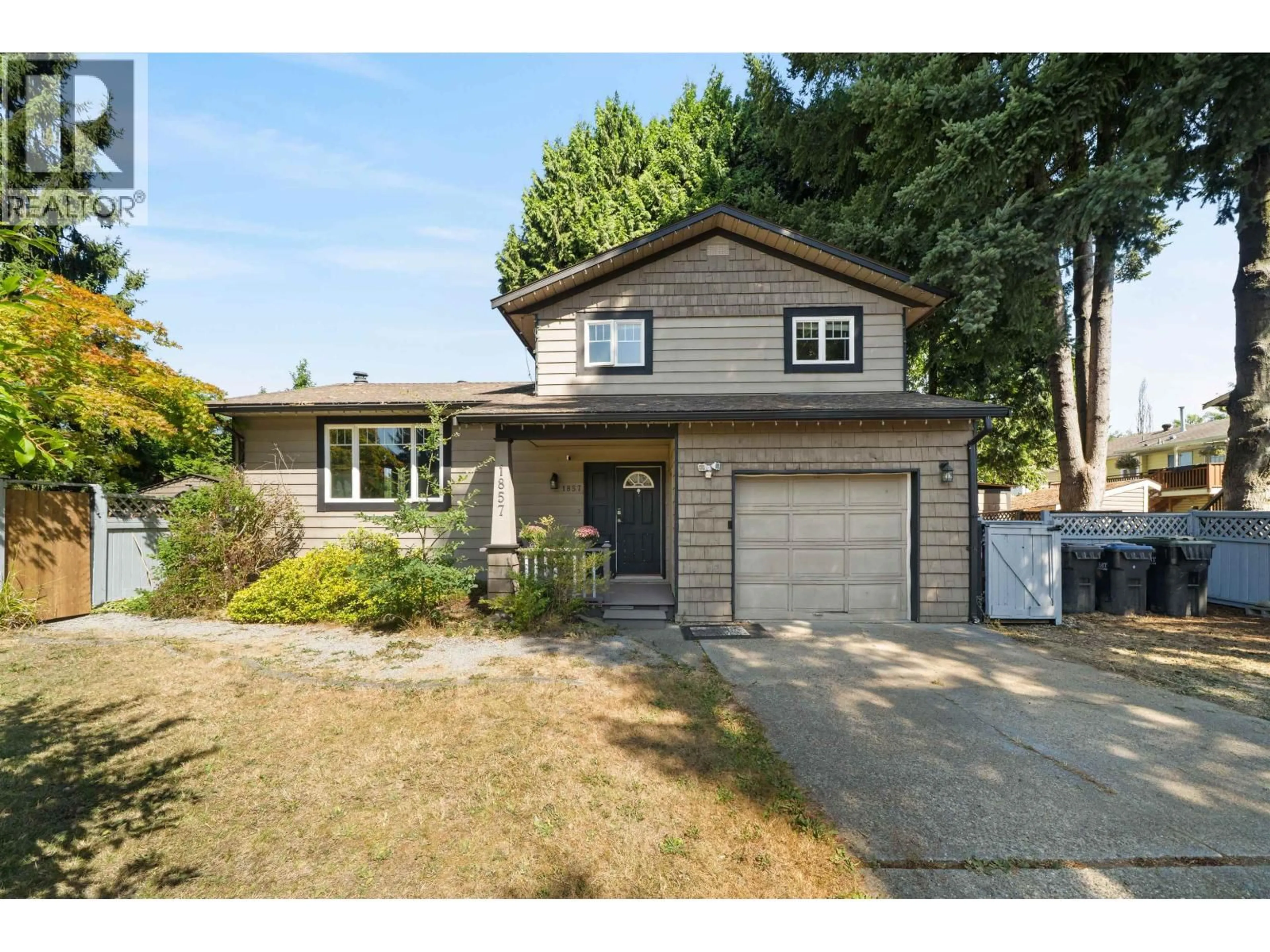 Home with vinyl exterior material, street for 1857 WARWICK AVENUE, Port Coquitlam British Columbia V3C4P6