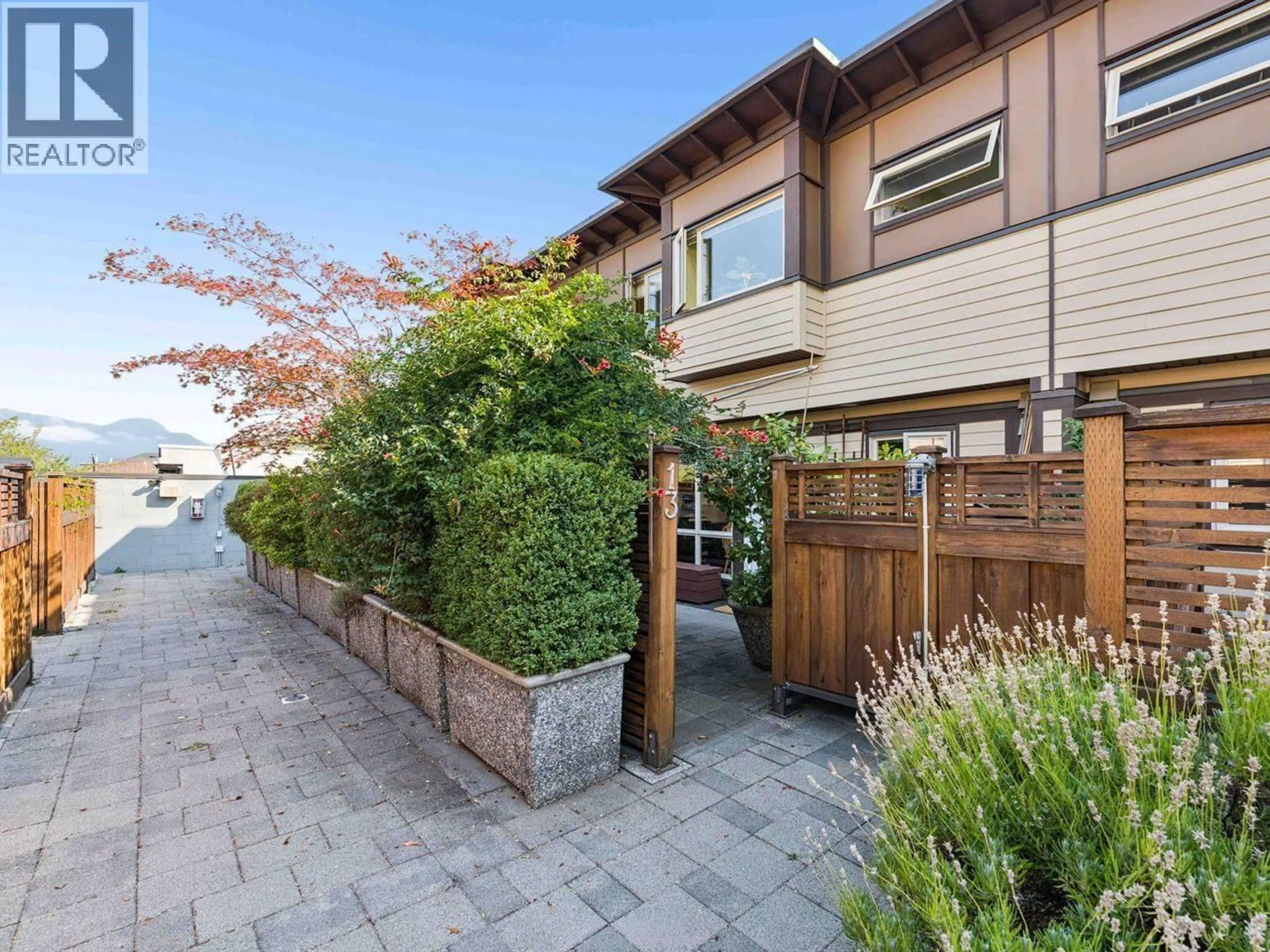 Home with brick exterior material, street for 13 - 2389 CHARLES STREET, Vancouver British Columbia V5L5G4
