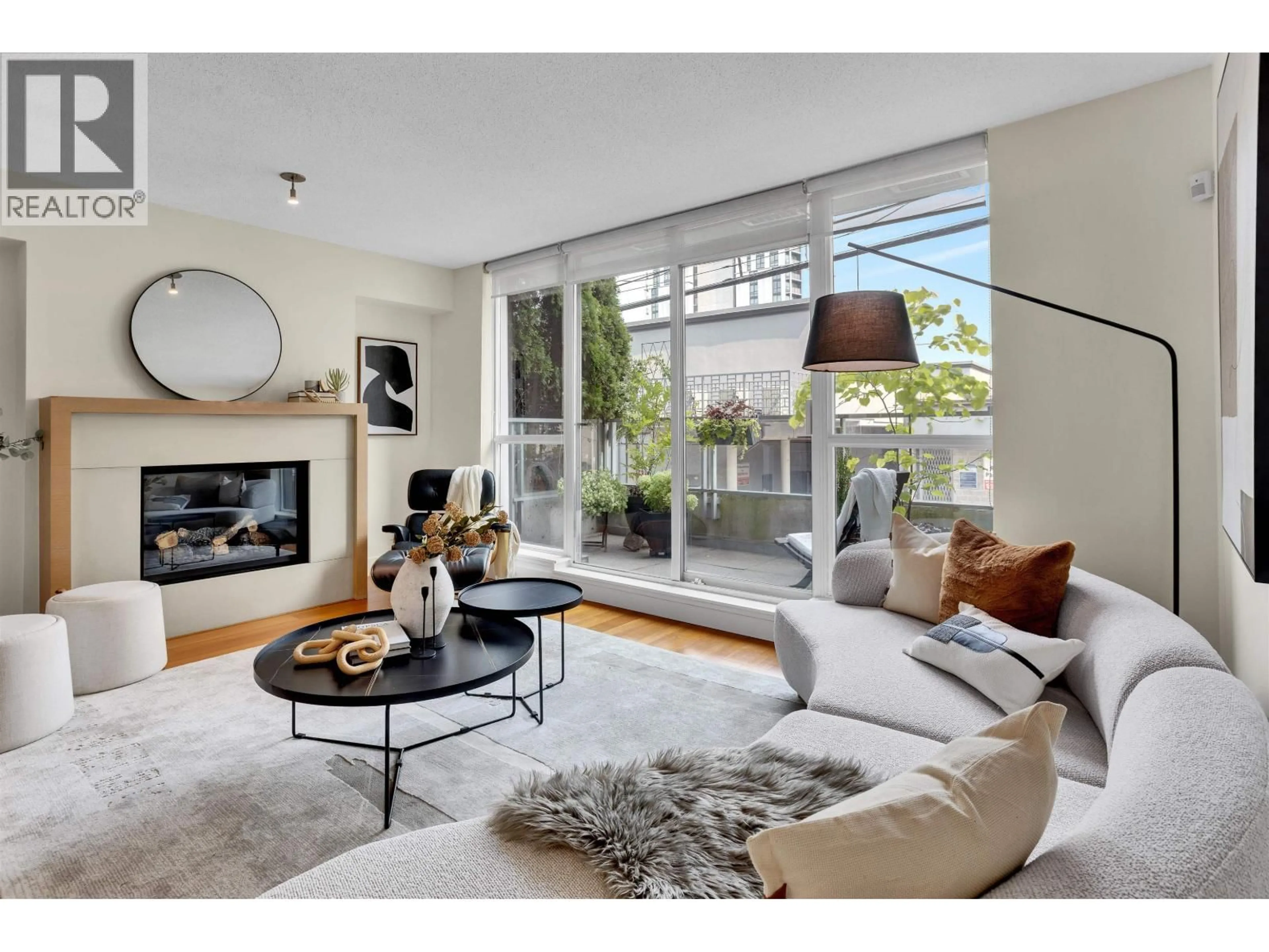 Living room with furniture, unknown for 202 - 1530 8TH AVENUE, Vancouver British Columbia V6J5M6