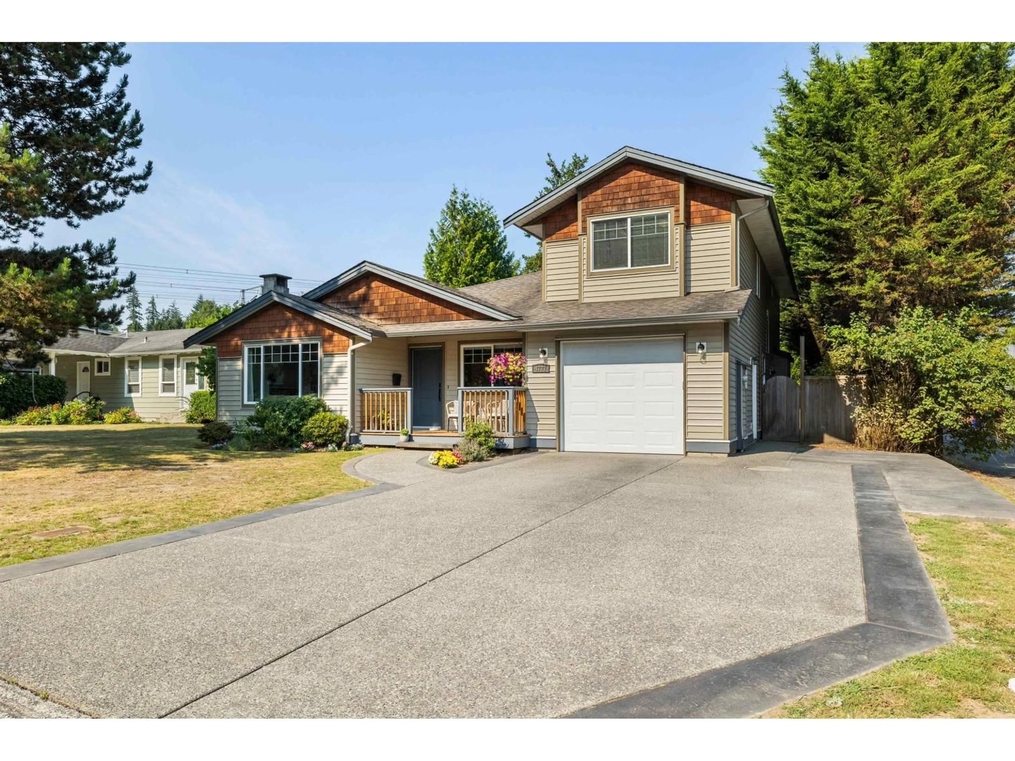 Home with vinyl exterior material, street for 4777 200A STREET, Langley British Columbia V3A6R1