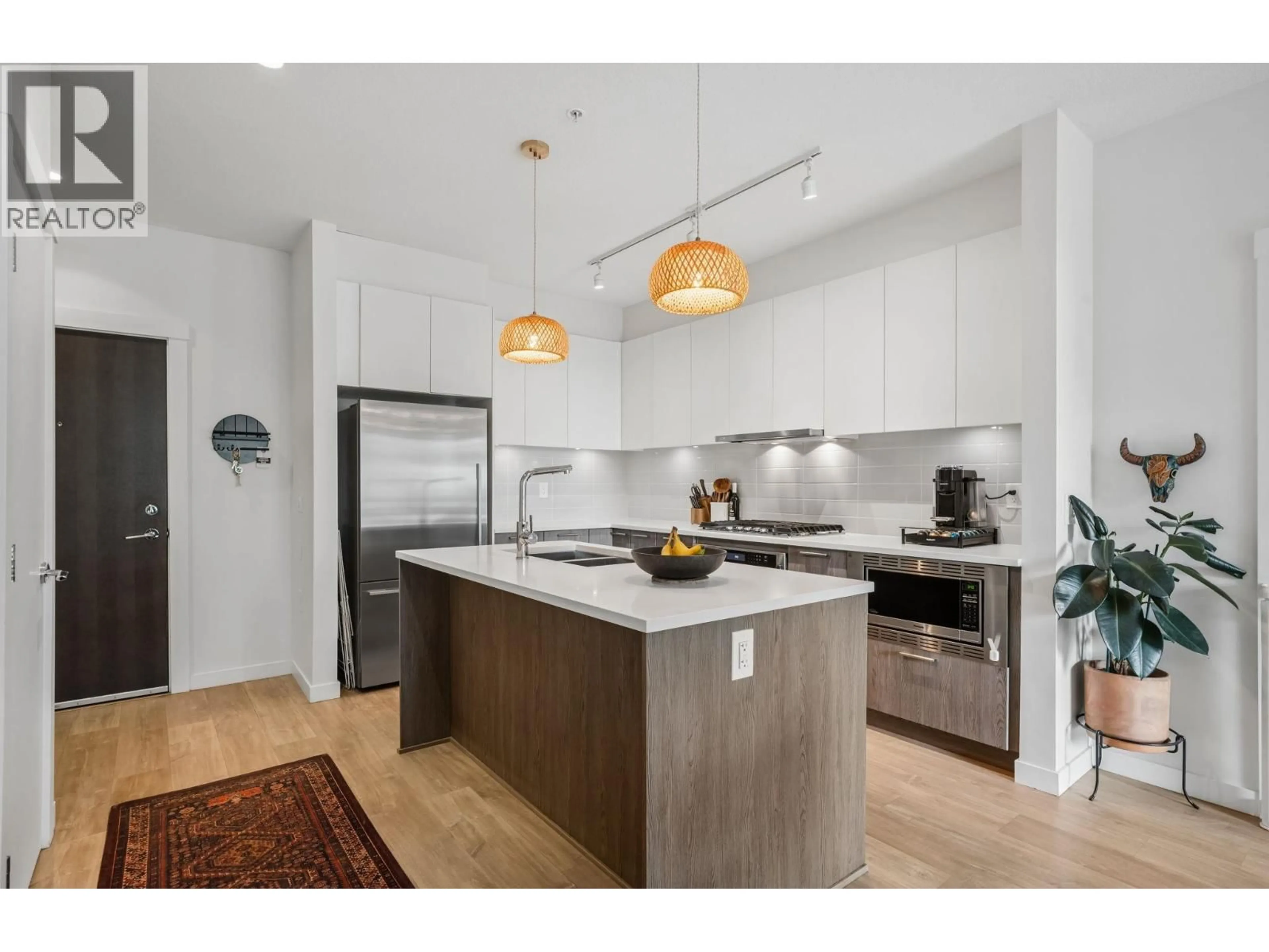 Open concept kitchen, unknown for 105 - 625 3RD STREET, North Vancouver British Columbia V7L1G6