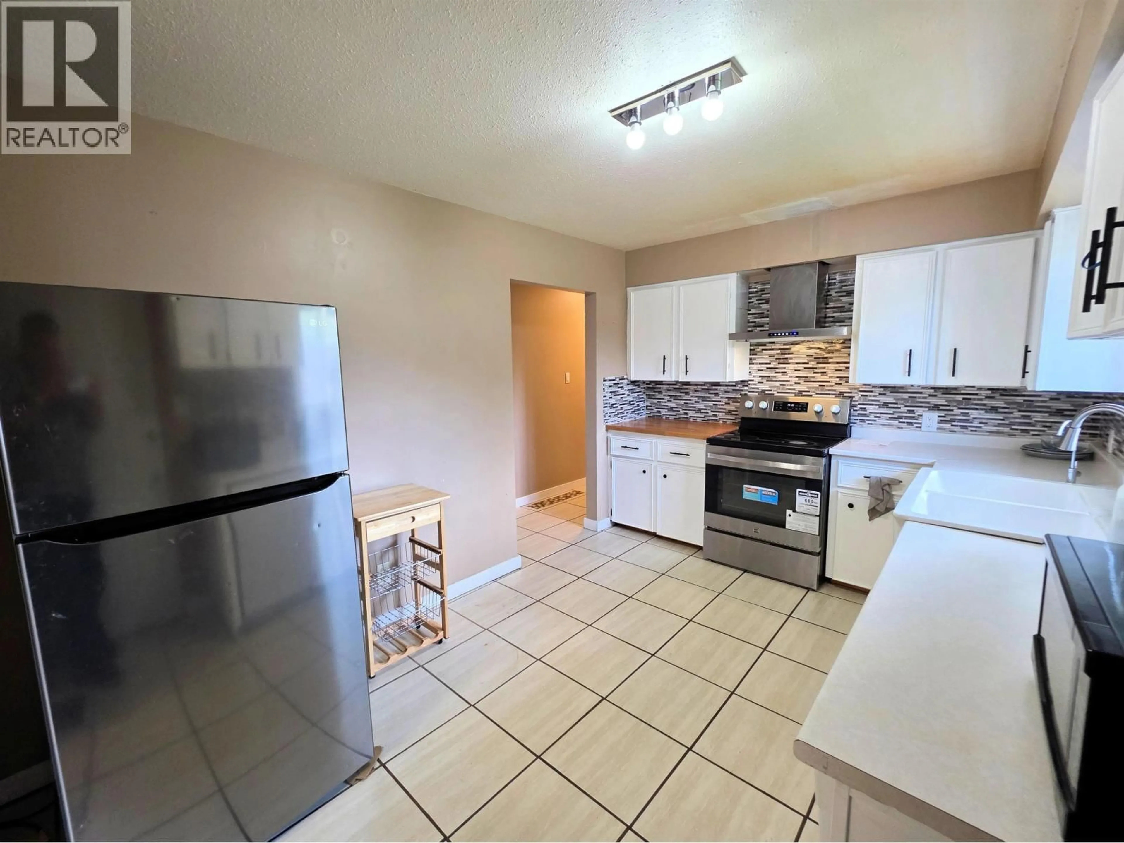 Standard kitchen, ceramic/tile floor for 1753 KENWOOD STREET, Prince George British Columbia V2L1S4