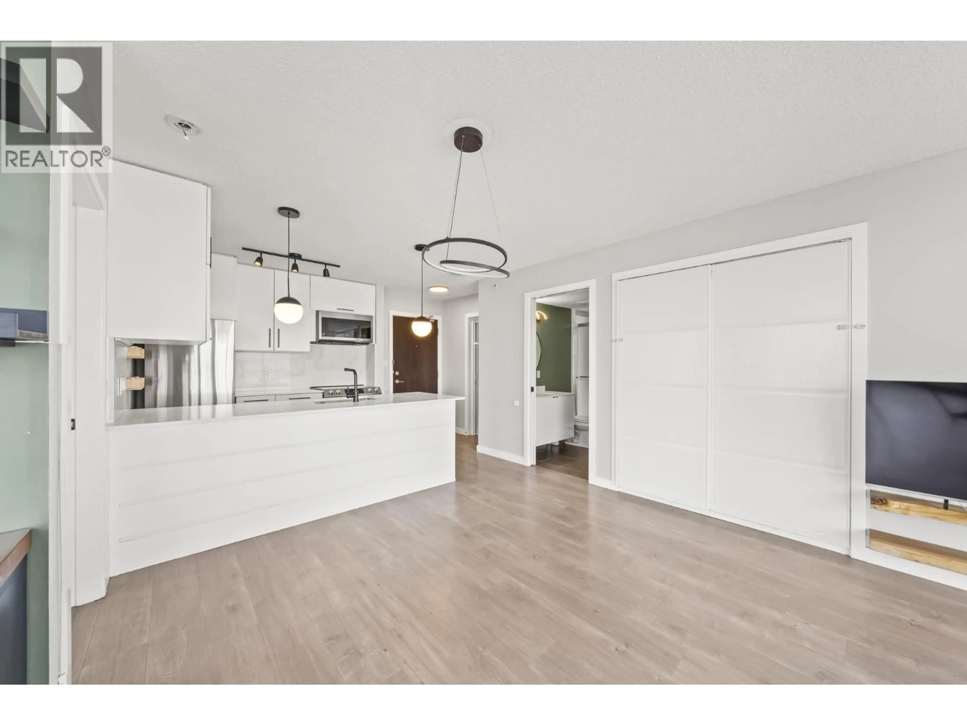 Open concept kitchen, wood/laminate floor for 2202 - 689 ABBOTT STREET, Vancouver British Columbia V6B0J2