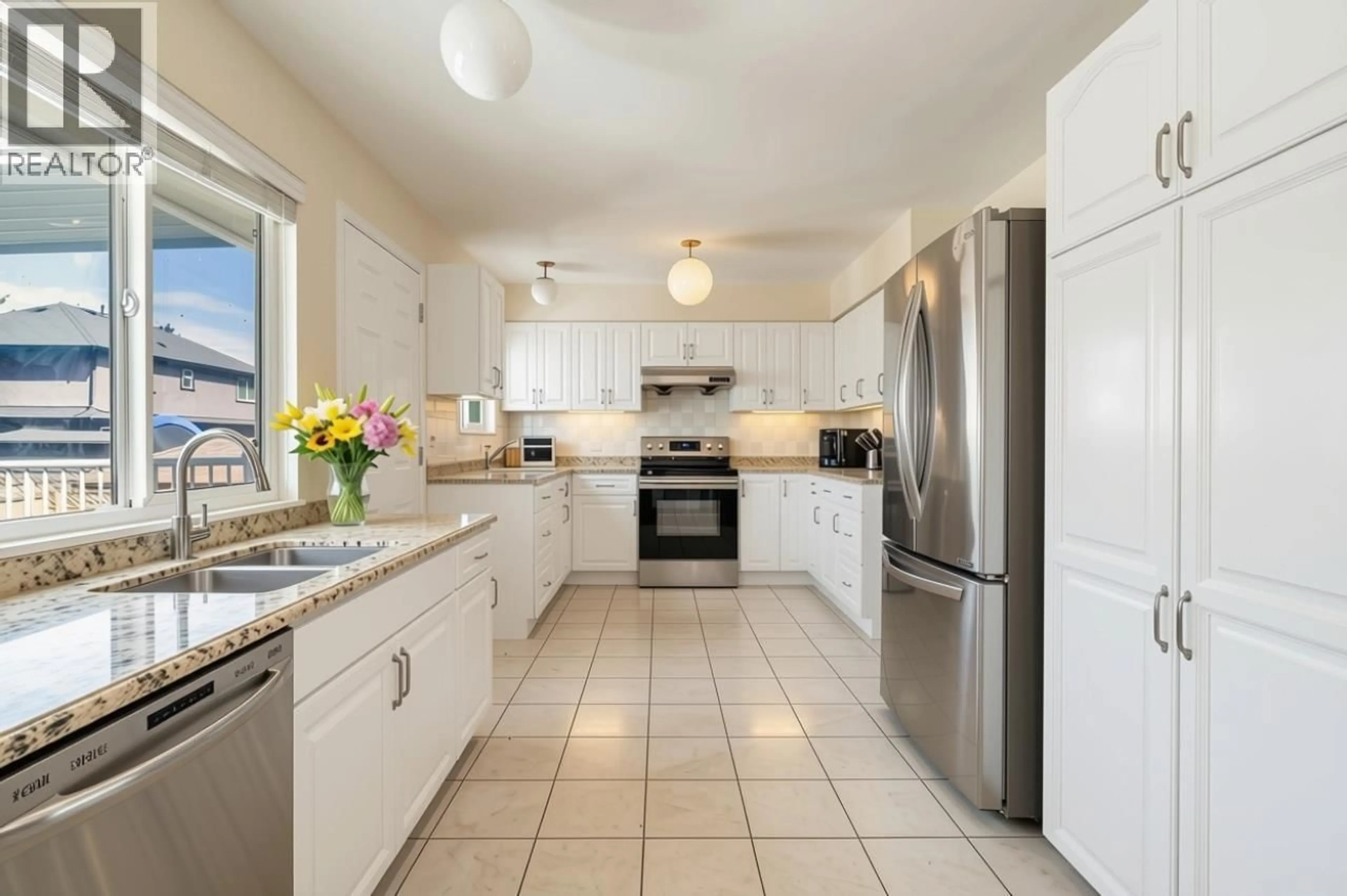 Open concept kitchen, ceramic/tile floor for 675 DUNCAN AVENUE, Burnaby British Columbia V5B4M1