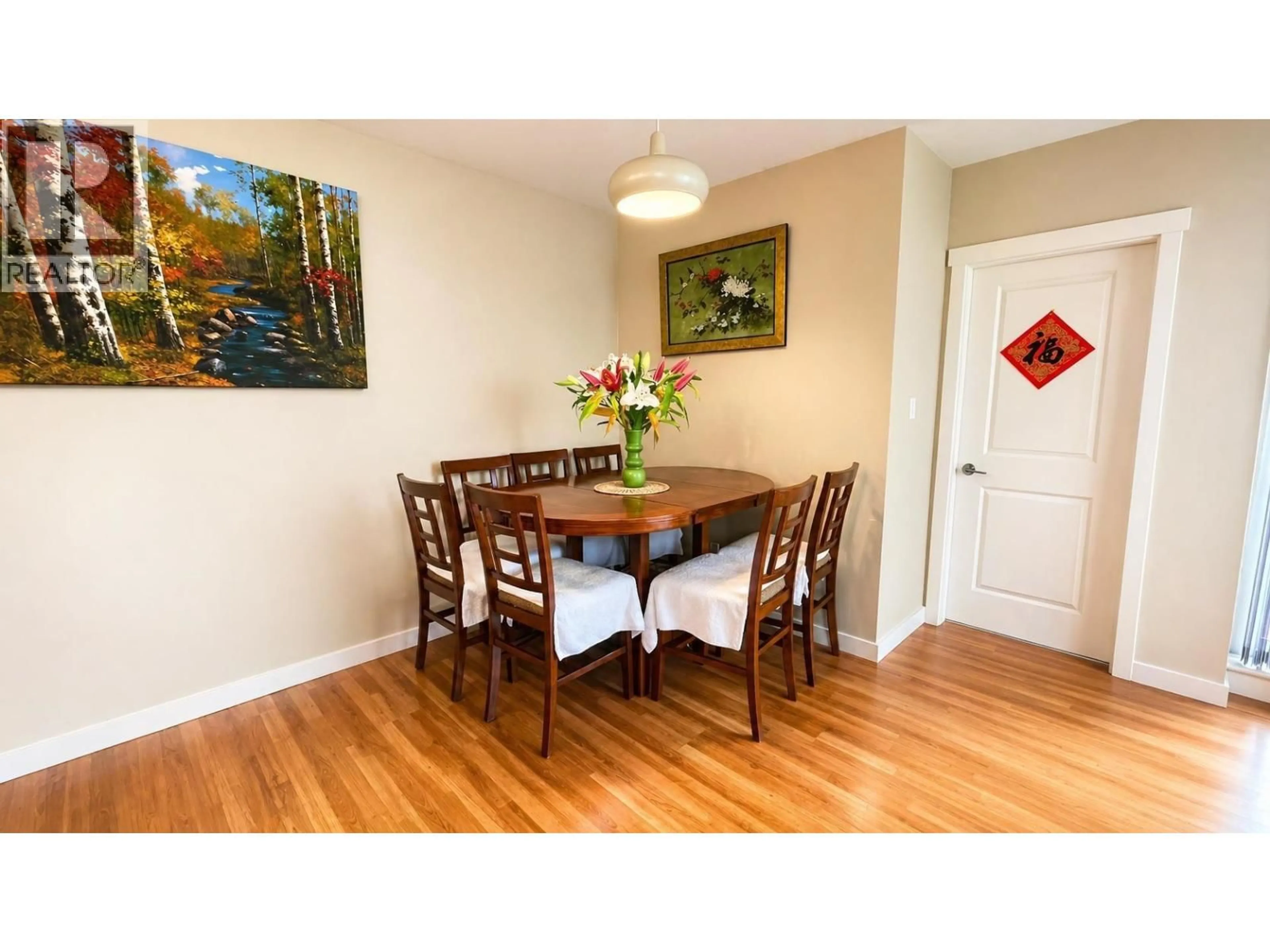 Dining room, wood/laminate floor for 601 - 9266 UNIVERSITY CRESCENT, Burnaby British Columbia V5A4Z1