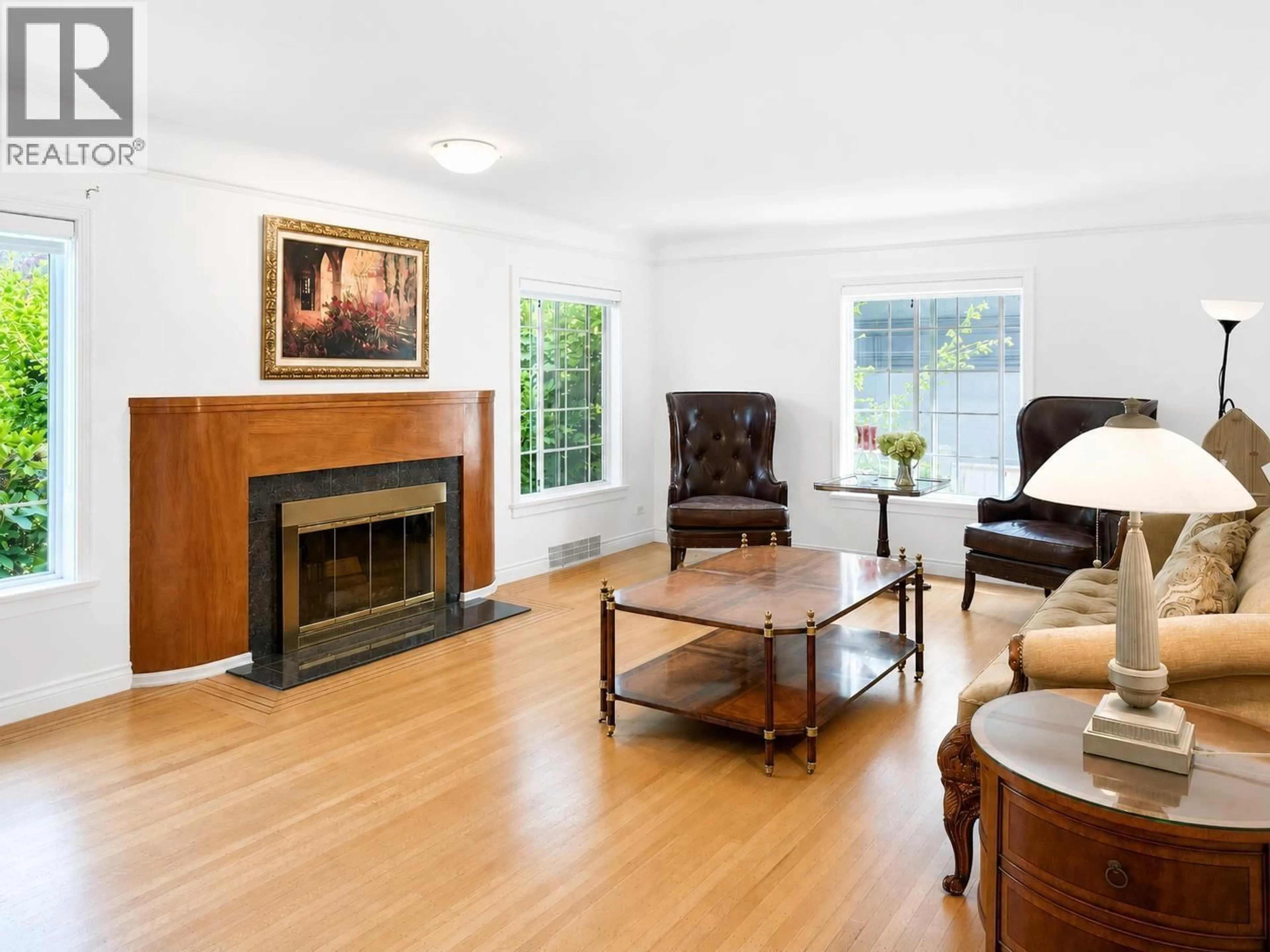 Living room with furniture, wood/laminate floor for 5809 SELKIRK STREET, Vancouver British Columbia V6M2Y5