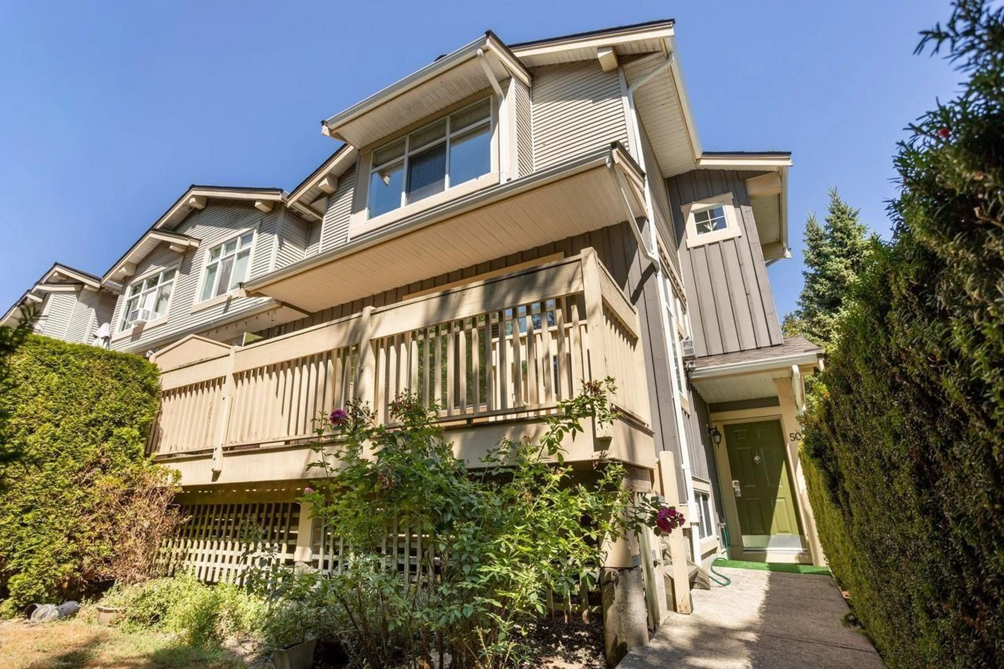 Home with vinyl exterior material, street for 50 - 14959 58 AVENUE, Surrey British Columbia V3S9Y9