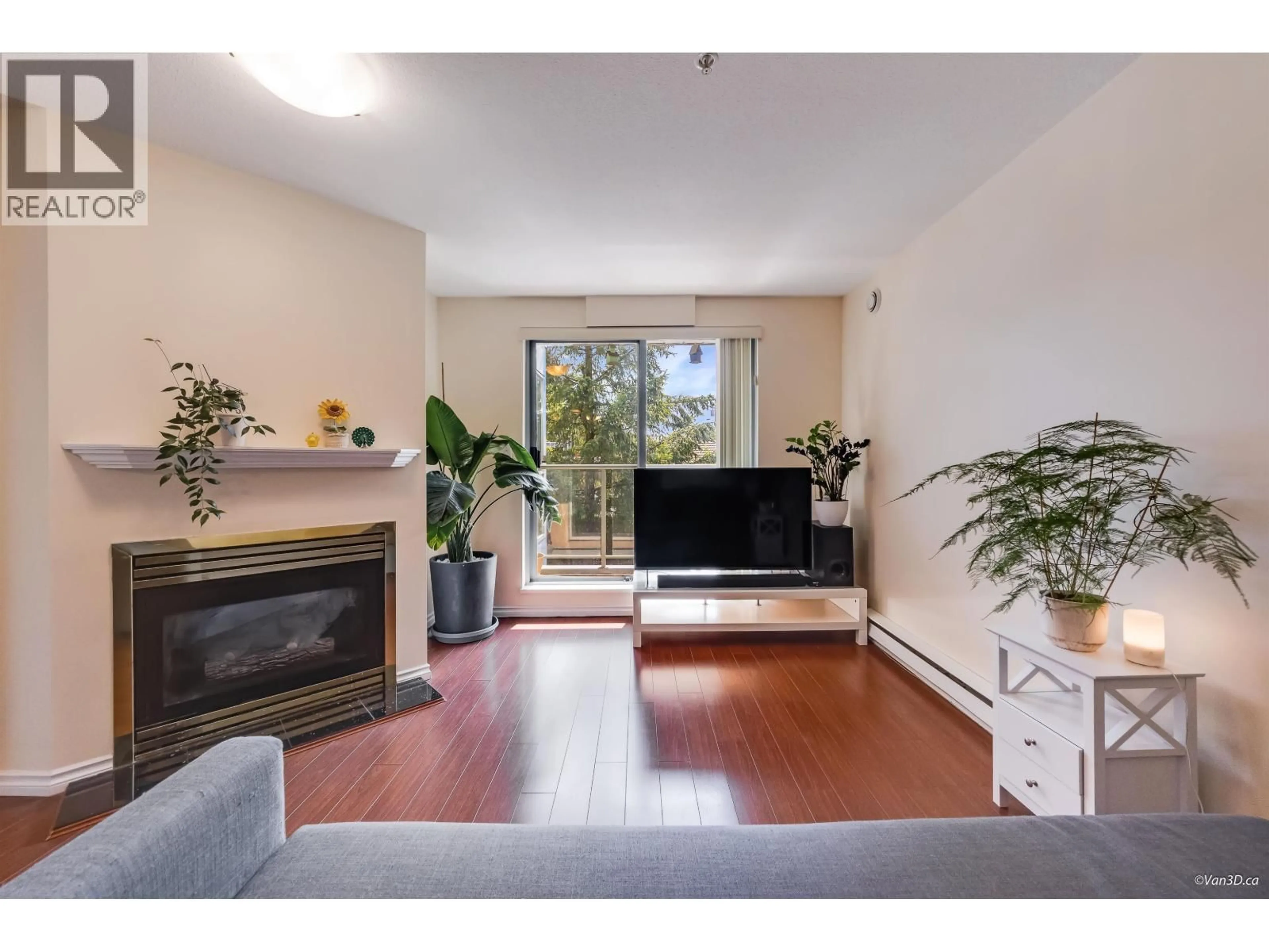 Living room with furniture, wood/laminate floor for 209 - 5818 LINCOLN STREET, Vancouver British Columbia V5R4P7