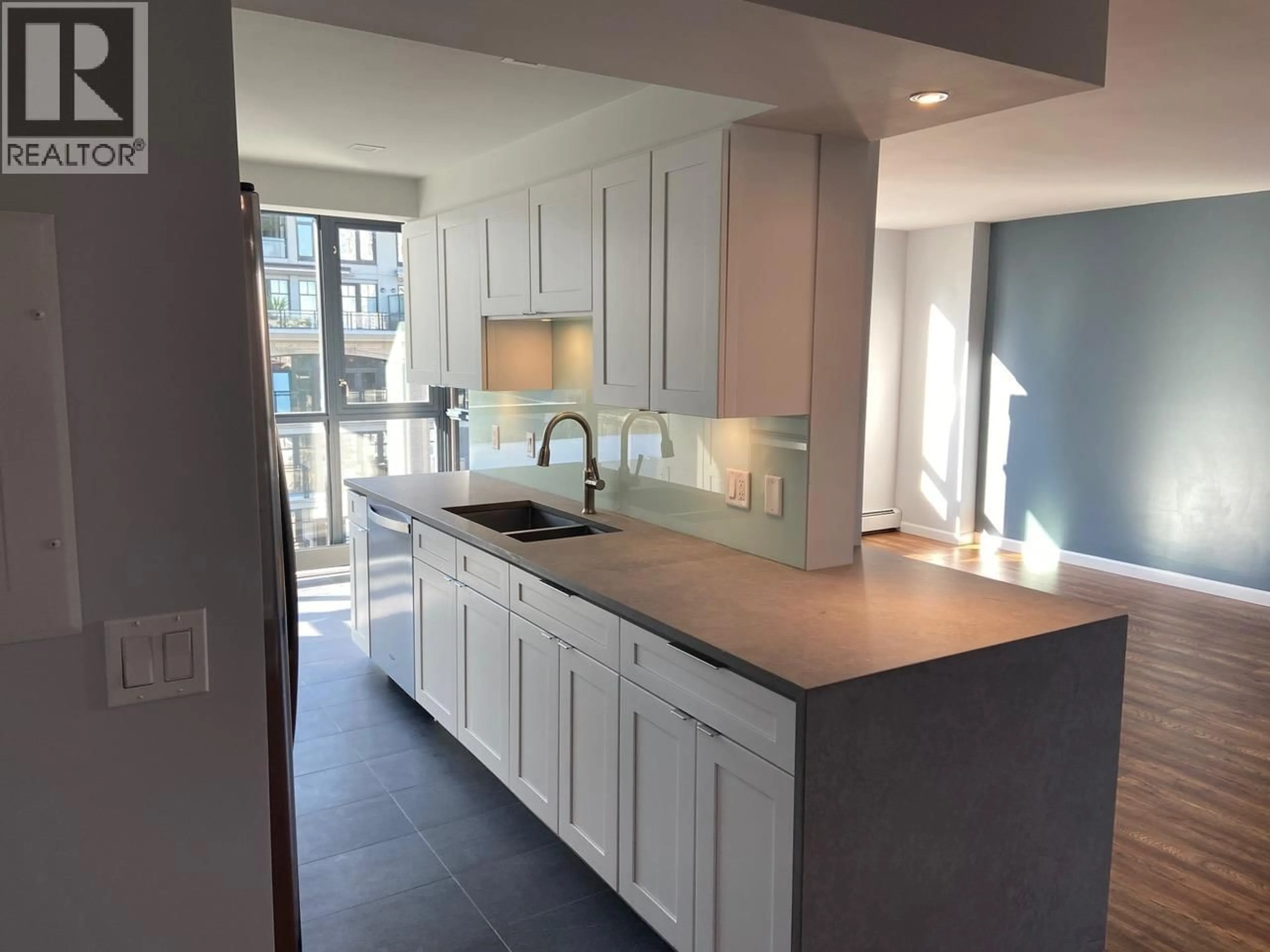 Open concept kitchen, ceramic/tile floor for 701 - 289 DRAKE STREET, Vancouver British Columbia V6B5Z6
