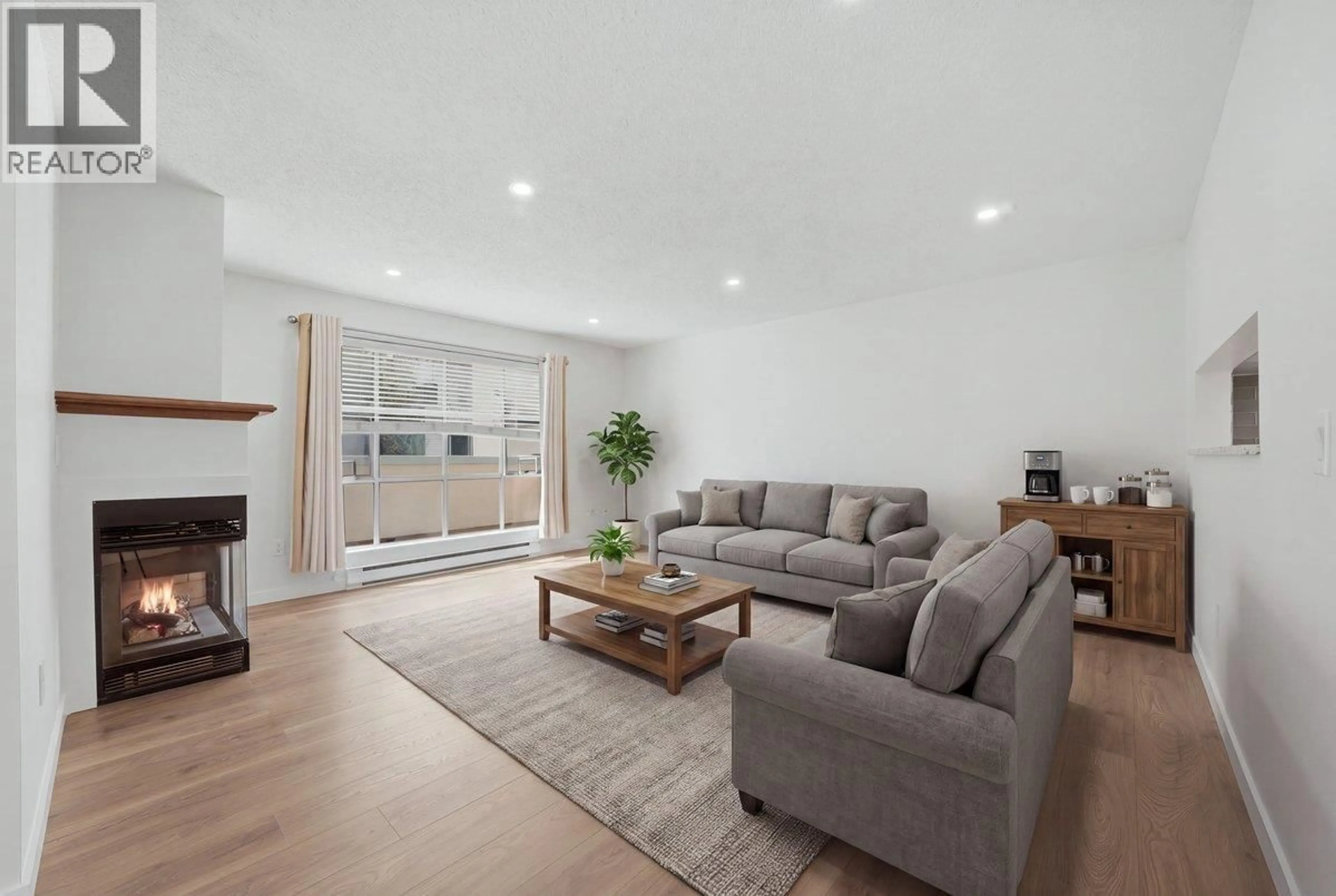 Living room with furniture, wood/laminate floor for 114 - 7580 MINORU BOULEVARD, Richmond British Columbia V6Y1Z5