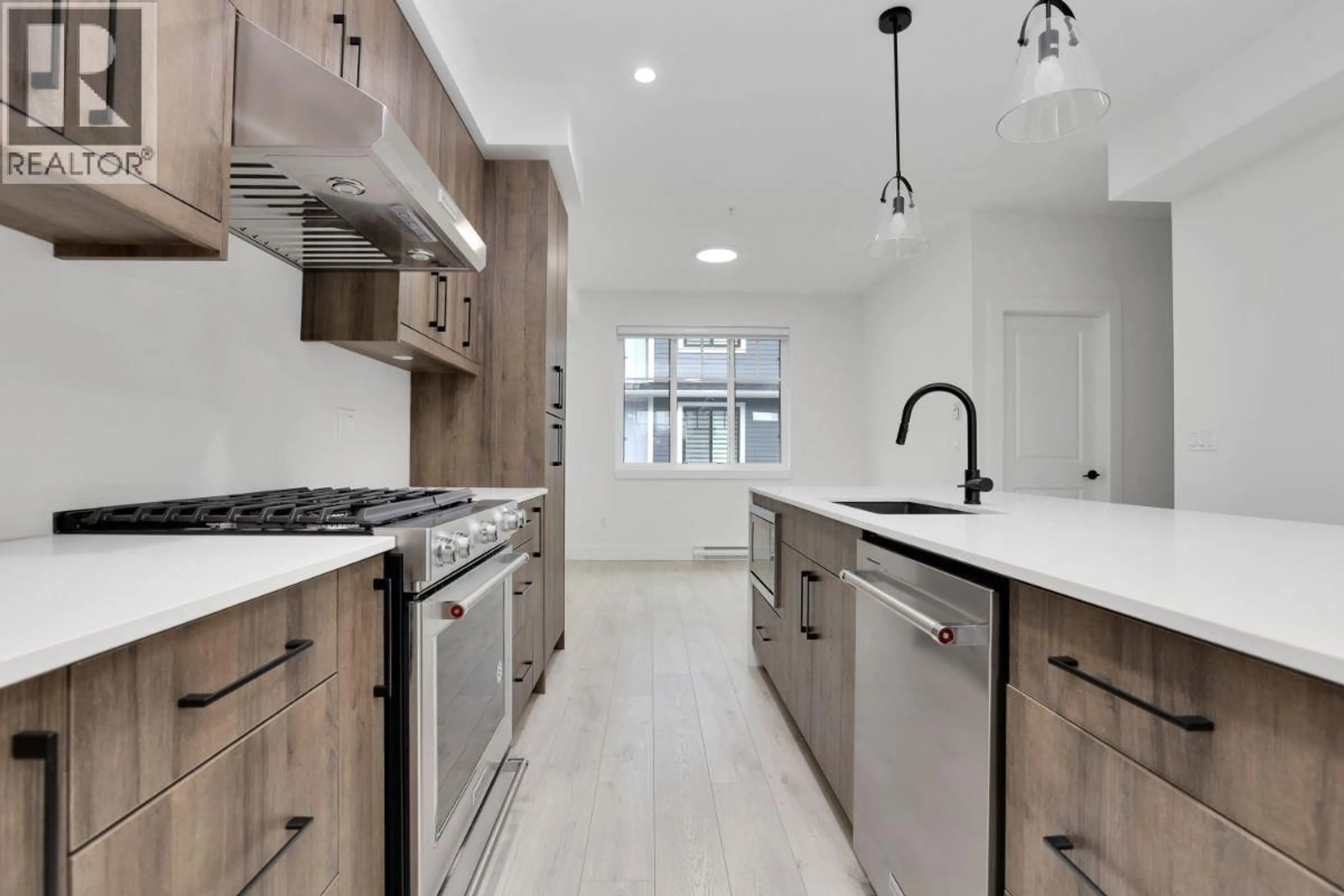 Open concept kitchen, unknown for 12 - 789 OTA AVENUE, New Westminster British Columbia V3M0M7