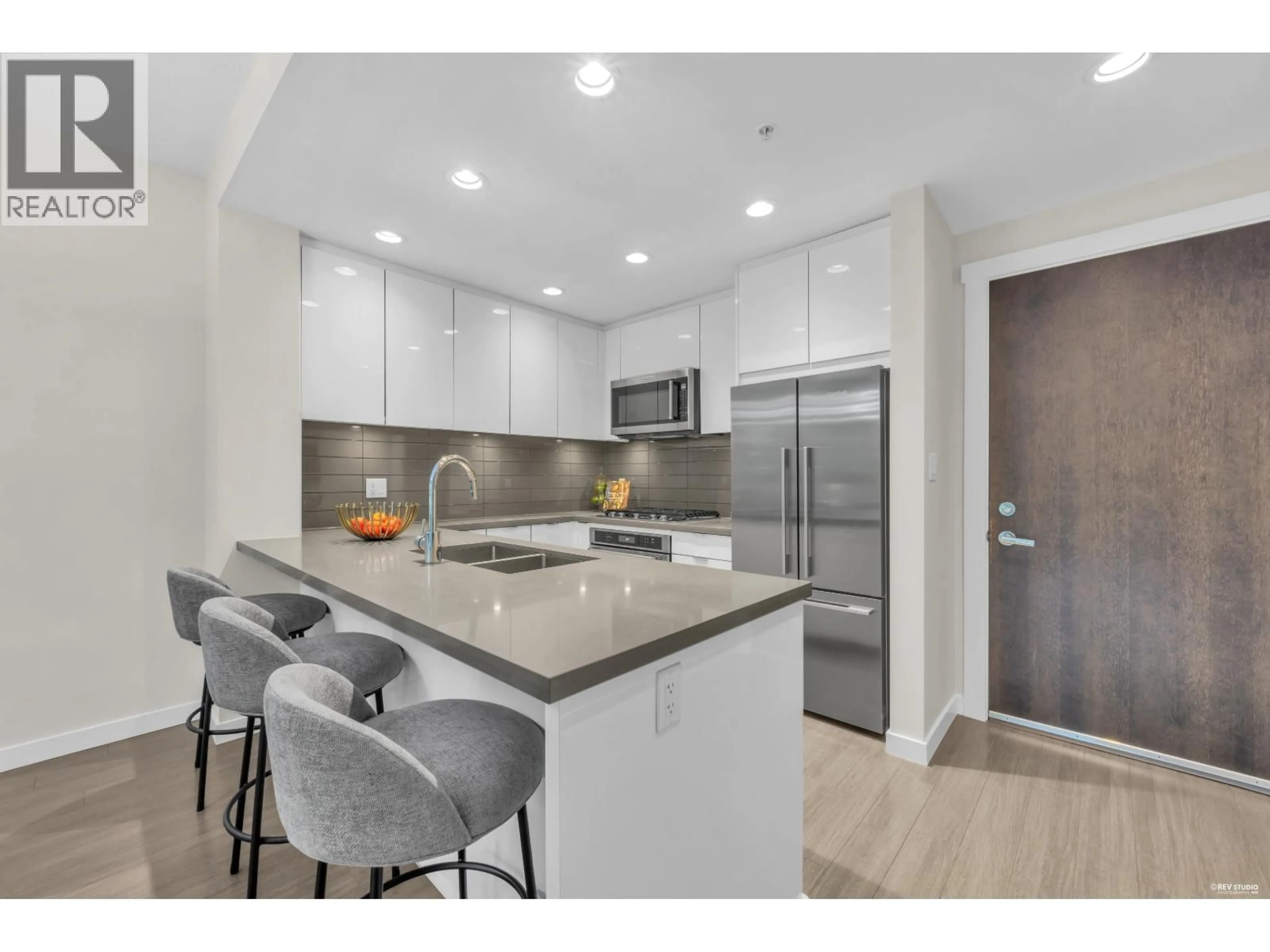 Open concept kitchen, unknown for 315 - 255 1ST STREET, North Vancouver British Columbia V7M3G8