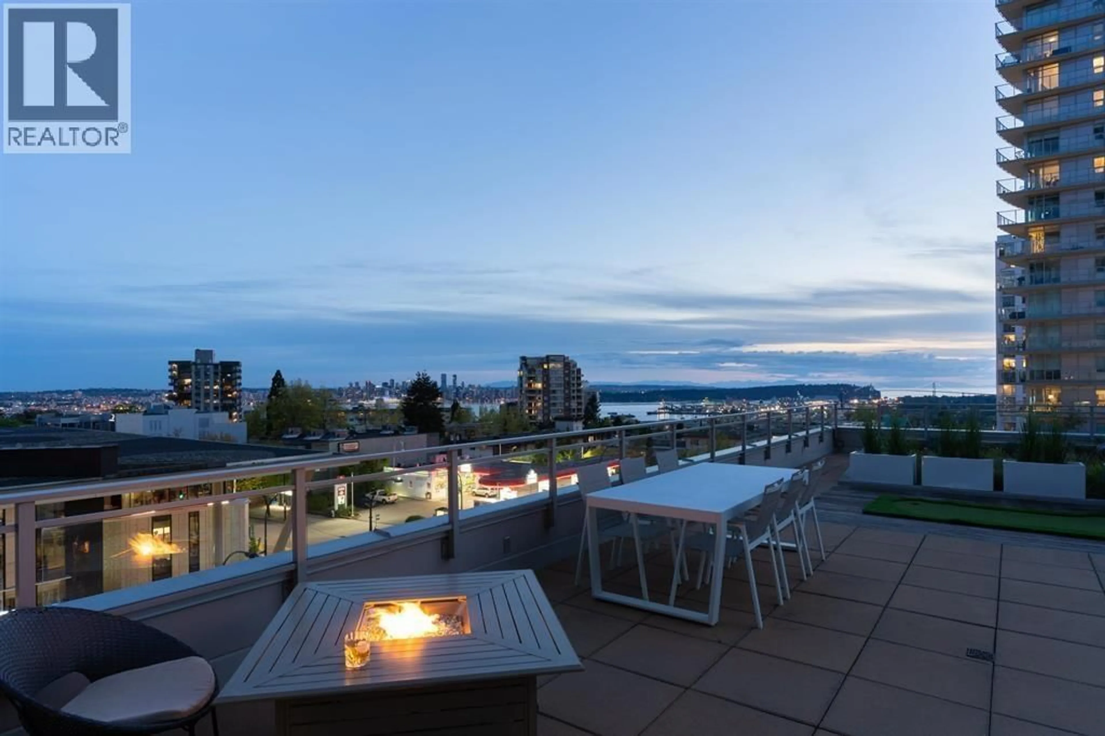 Patio, city buildings view from balcony for 306 - 112 13 STREET, North Vancouver British Columbia V7L0E4
