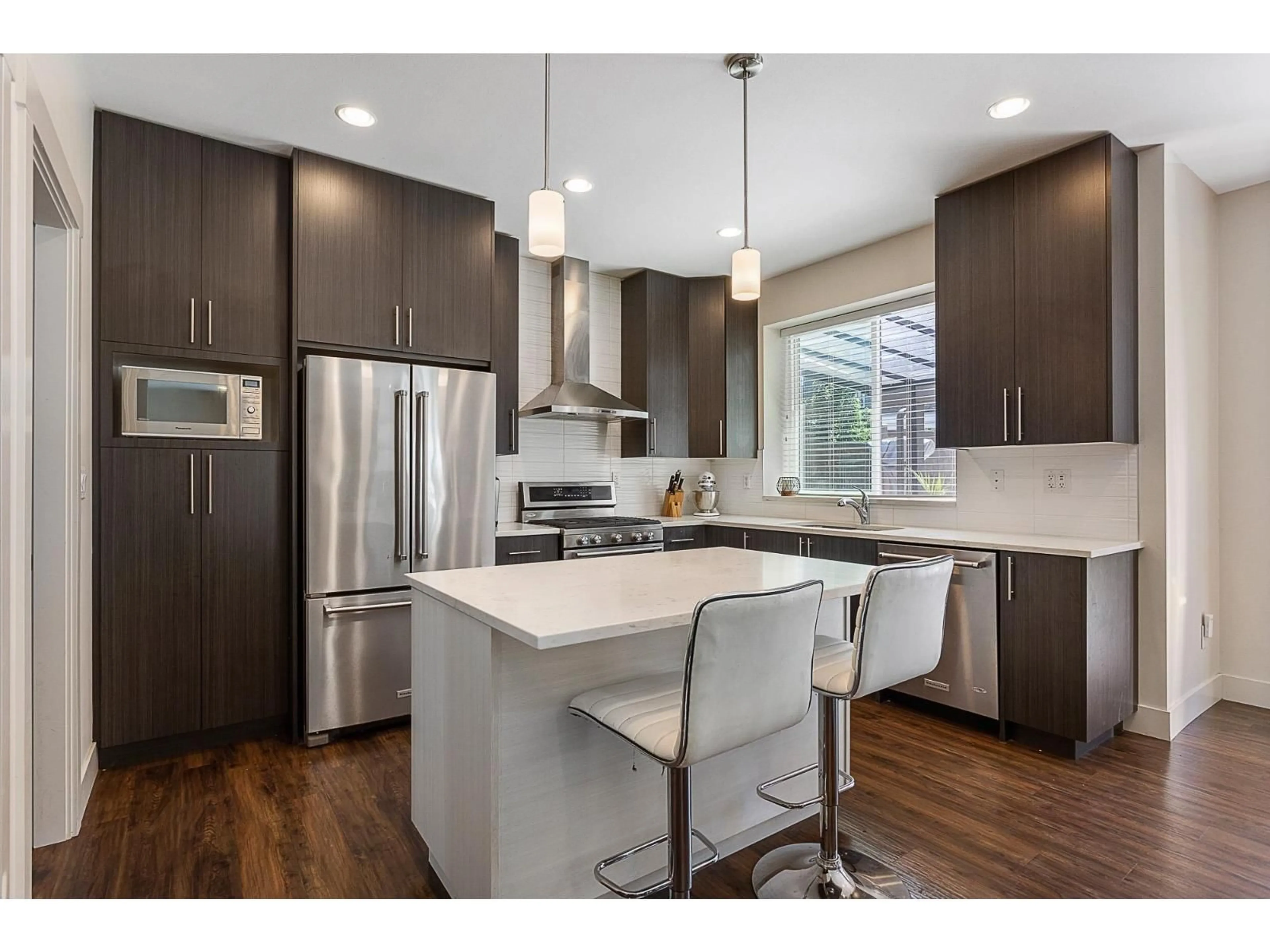 Open concept kitchen, wood/laminate floor for 47445 WITTENBERG PLACE, Chilliwack British Columbia V2R0L3