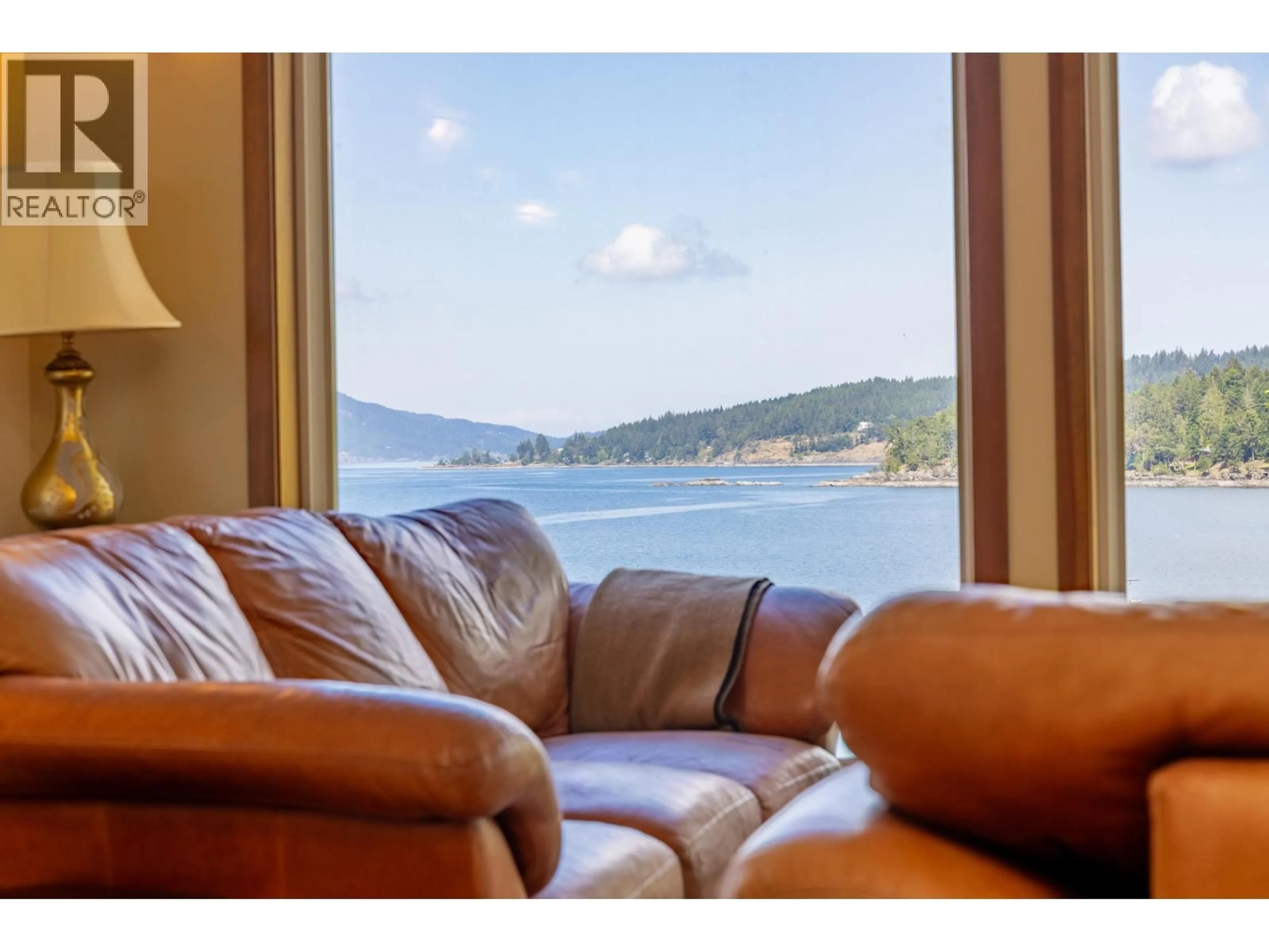 Living room with furniture, unknown for 1602 CHART DRIVE, Pender Island British Columbia V0N2M2
