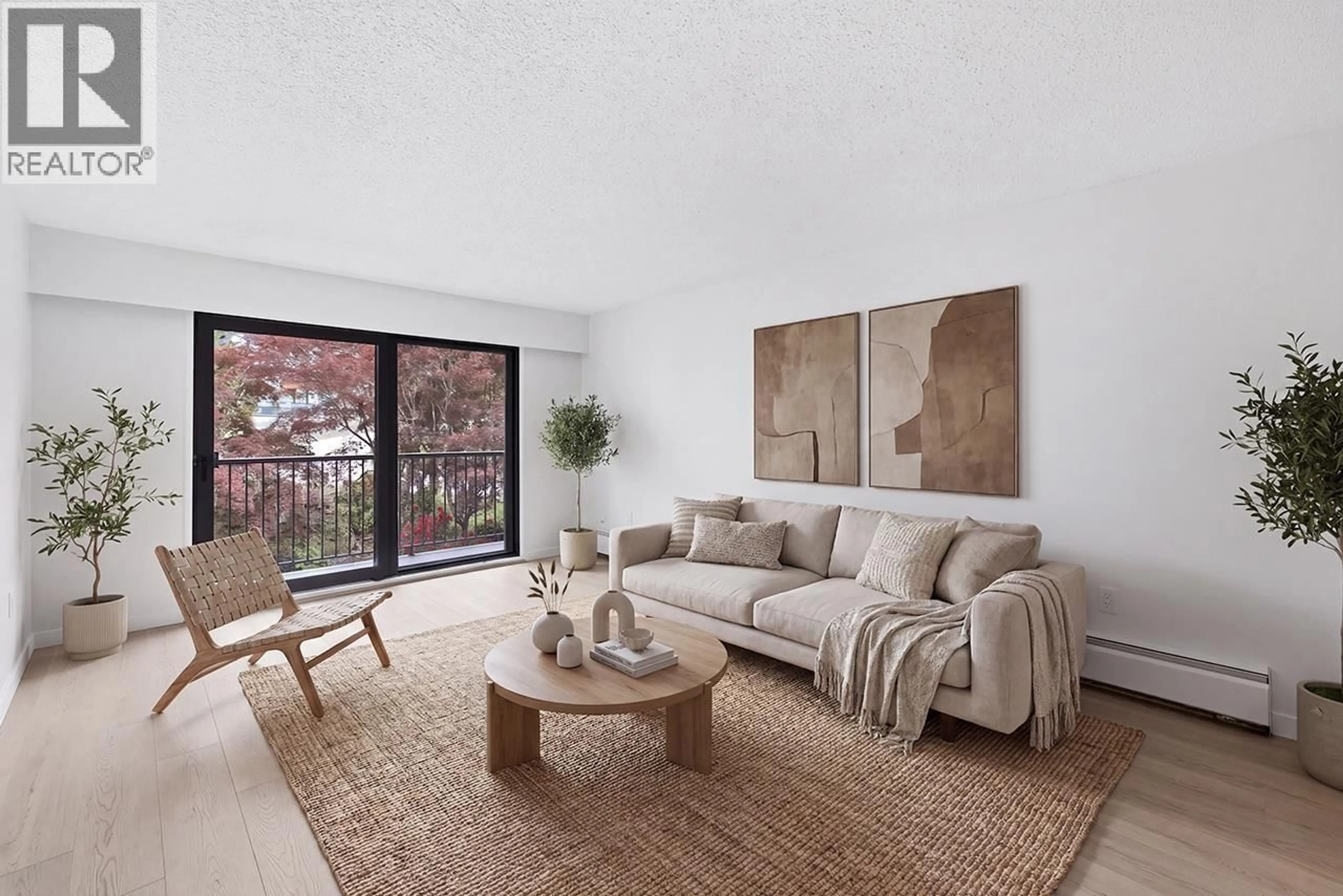 Living room with furniture, unknown for 313 - 5450 EMPIRE DRIVE, Burnaby British Columbia V5B1N4