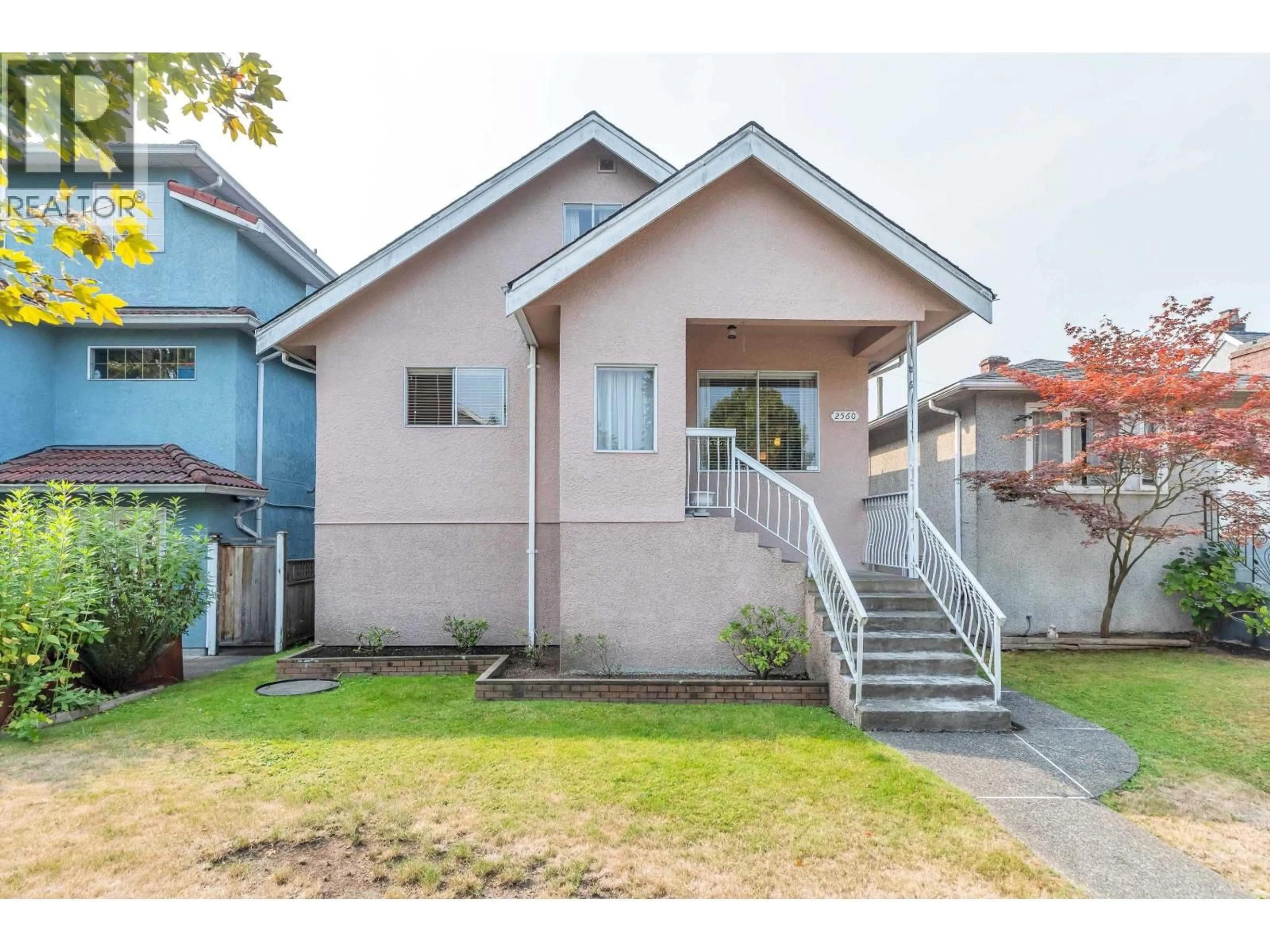 Home with vinyl exterior material, street for 2560 ADANAC STREET, Vancouver British Columbia V5K2M5