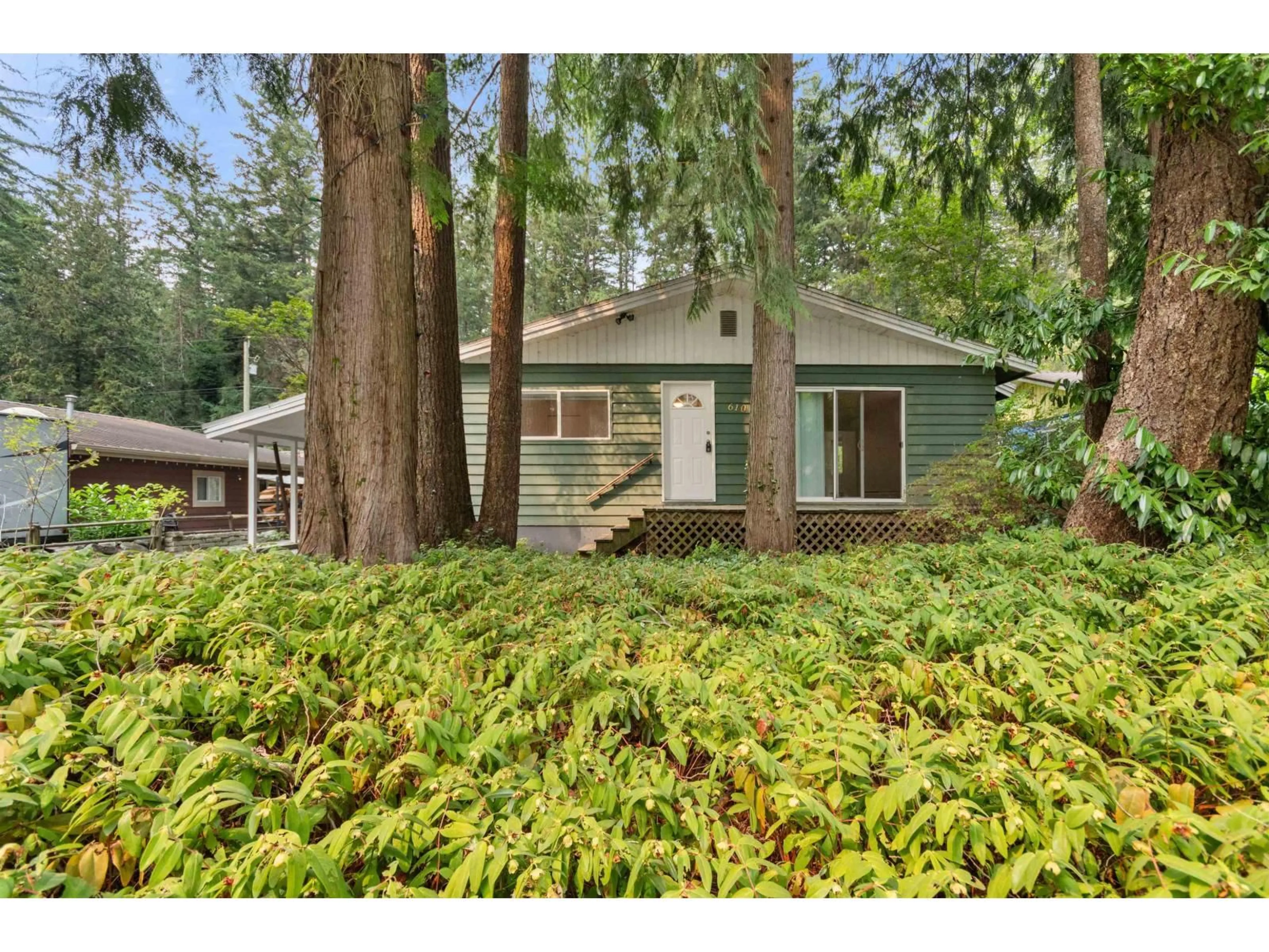 Home with vinyl exterior material, forest/trees view for 610 MOUNTAIN VIEW ROAD, Cultus Lake British Columbia V2R4Z5