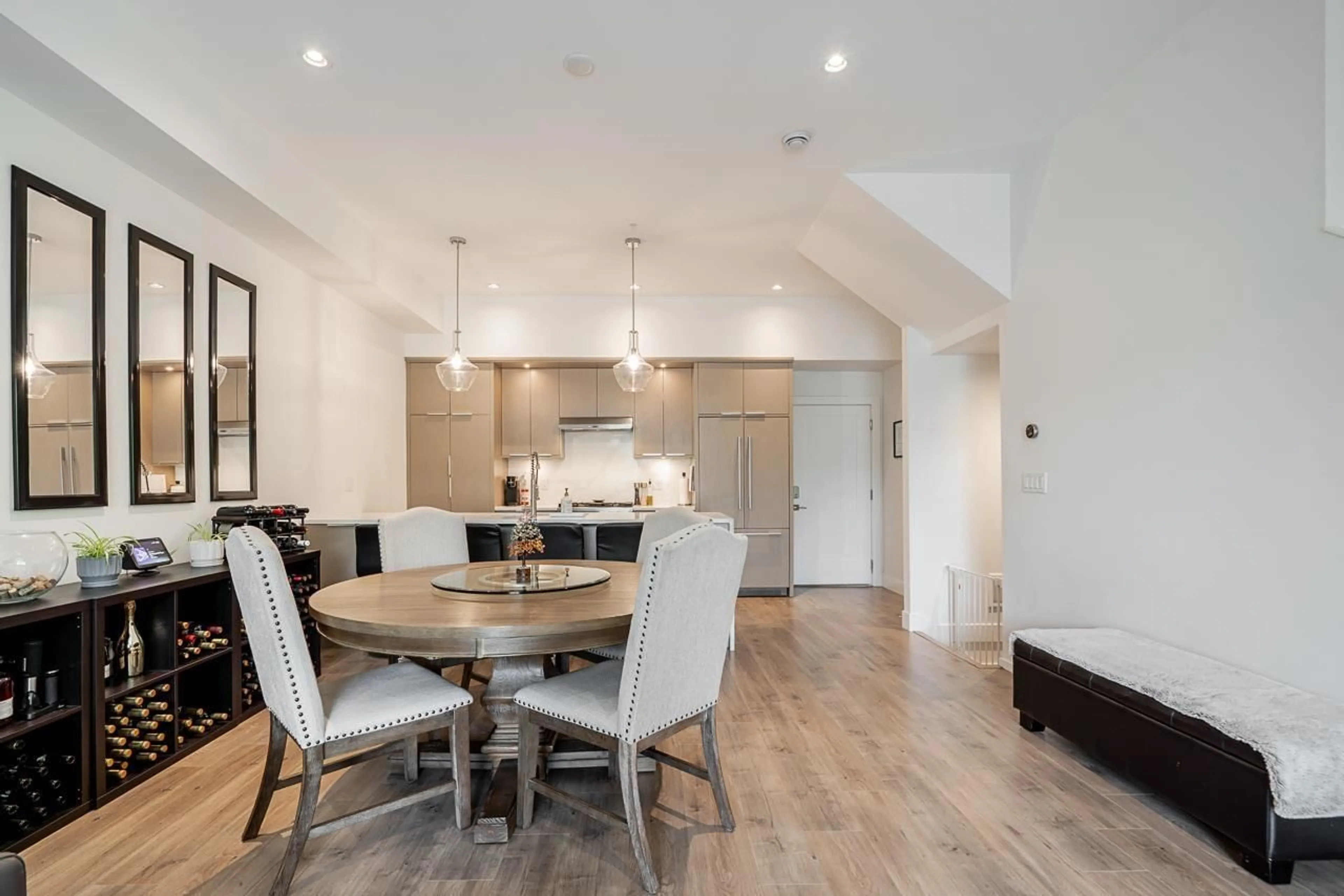 Open concept kitchen, wood/laminate floor for 8142 202 STREET, Langley British Columbia V2Y3K2