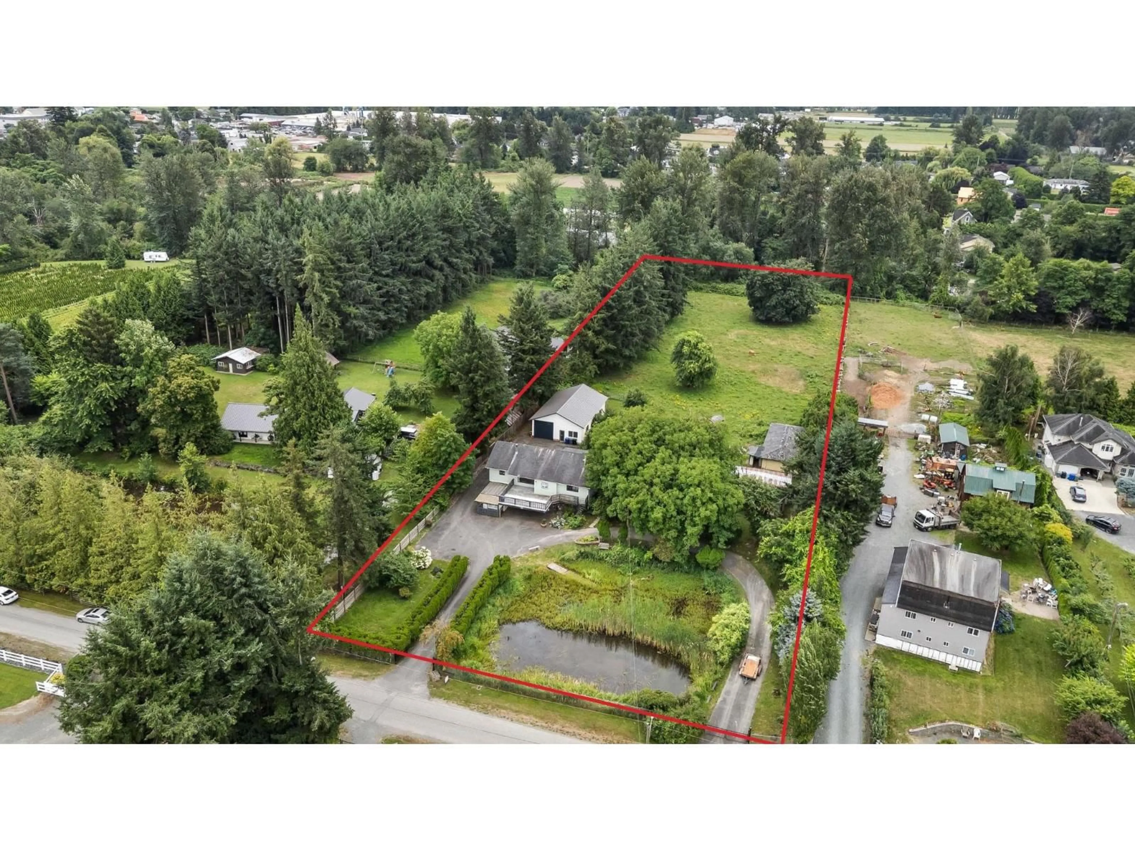 A pic from outside/outdoor area/front of a property/back of a property/a pic from drone, forest/trees view for 41692 HARE AVENUE, Yarrow British Columbia V2R5E9