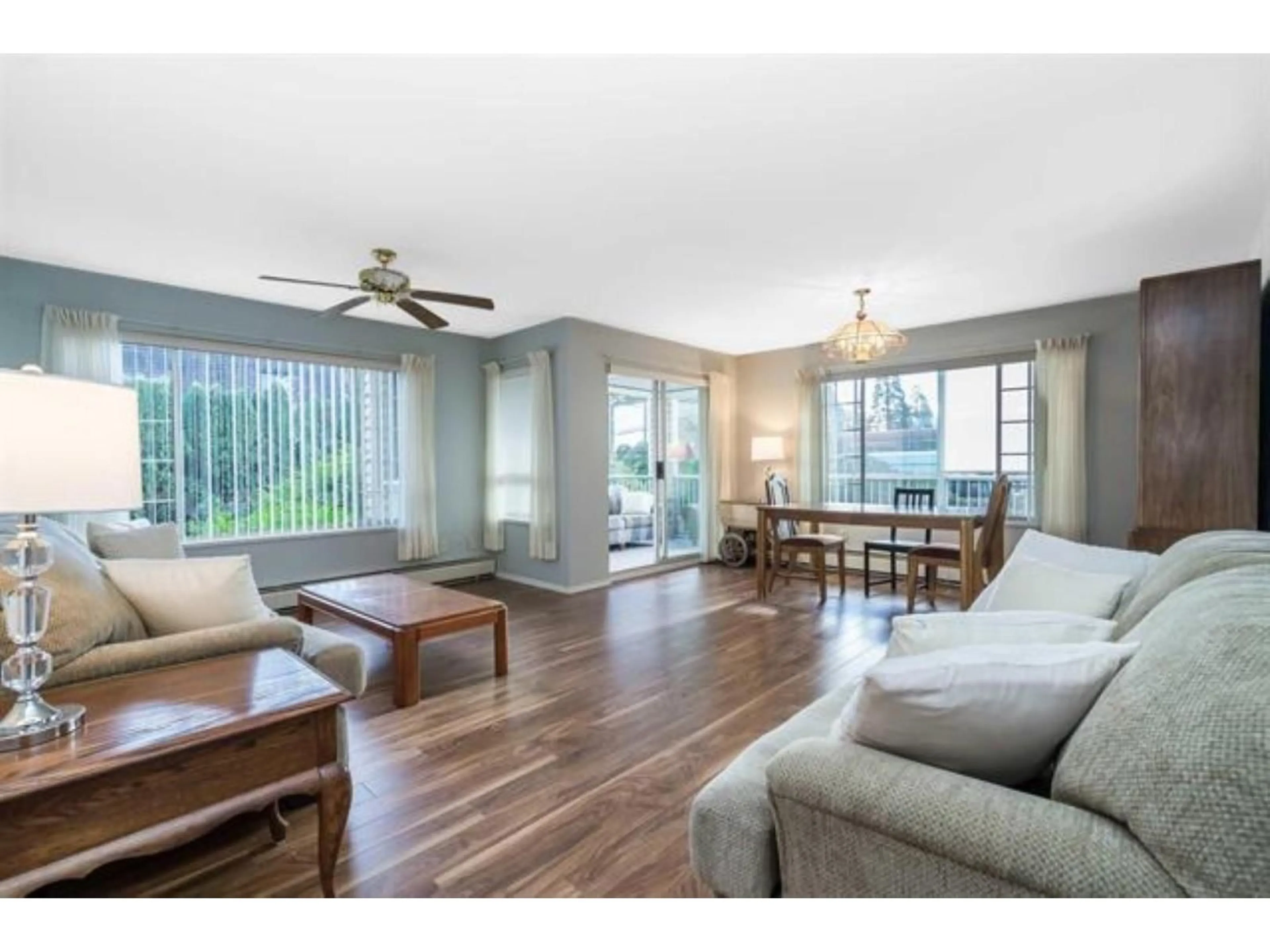 Living room with furniture, wood/laminate floor for 102 - 32145 OLD YALE ROAD, Abbotsford British Columbia V2T2C8