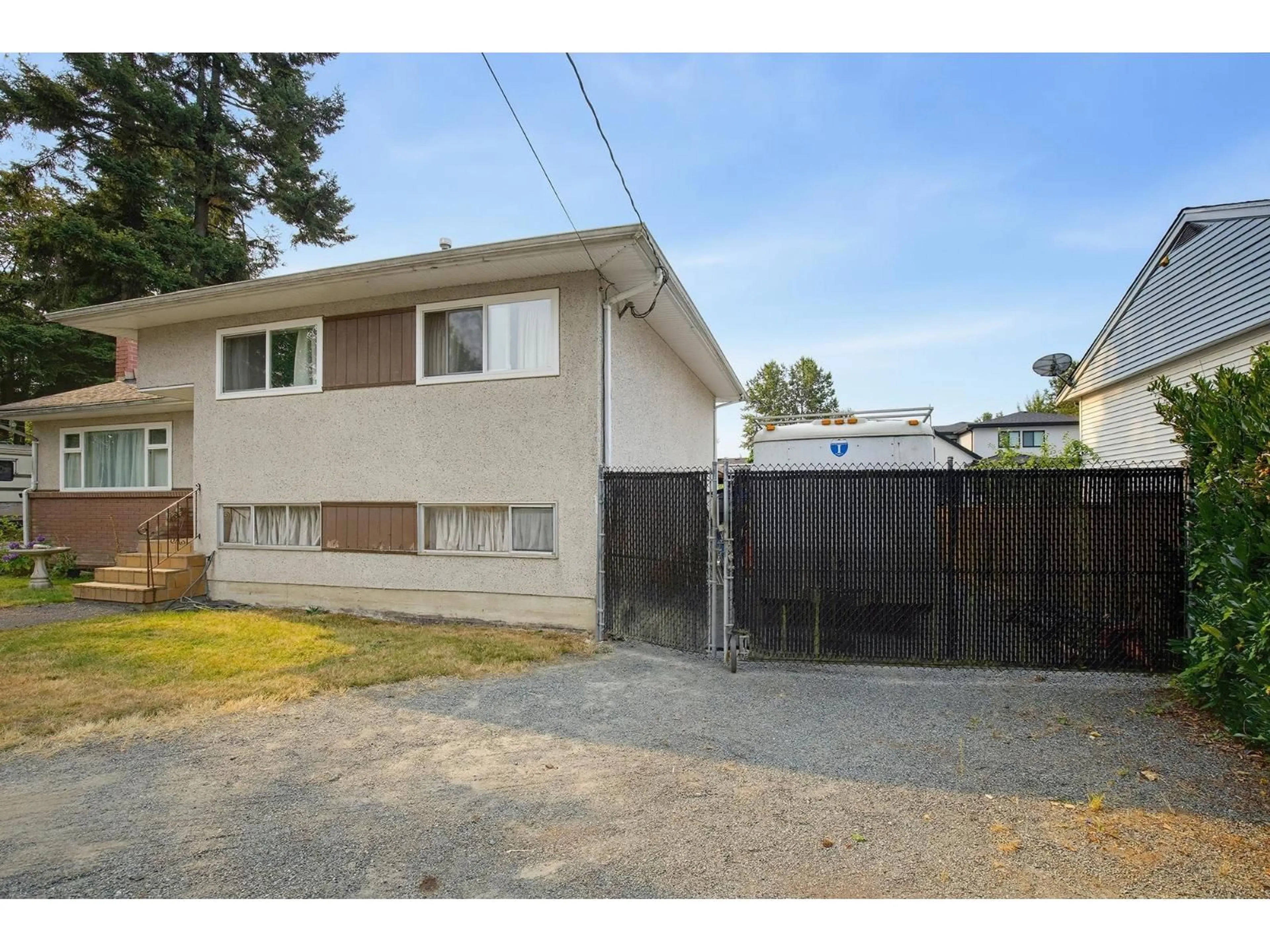 A pic from outside/outdoor area/front of a property/back of a property/a pic from drone, street for 13022 101 AVENUE, Surrey British Columbia V3T1L1