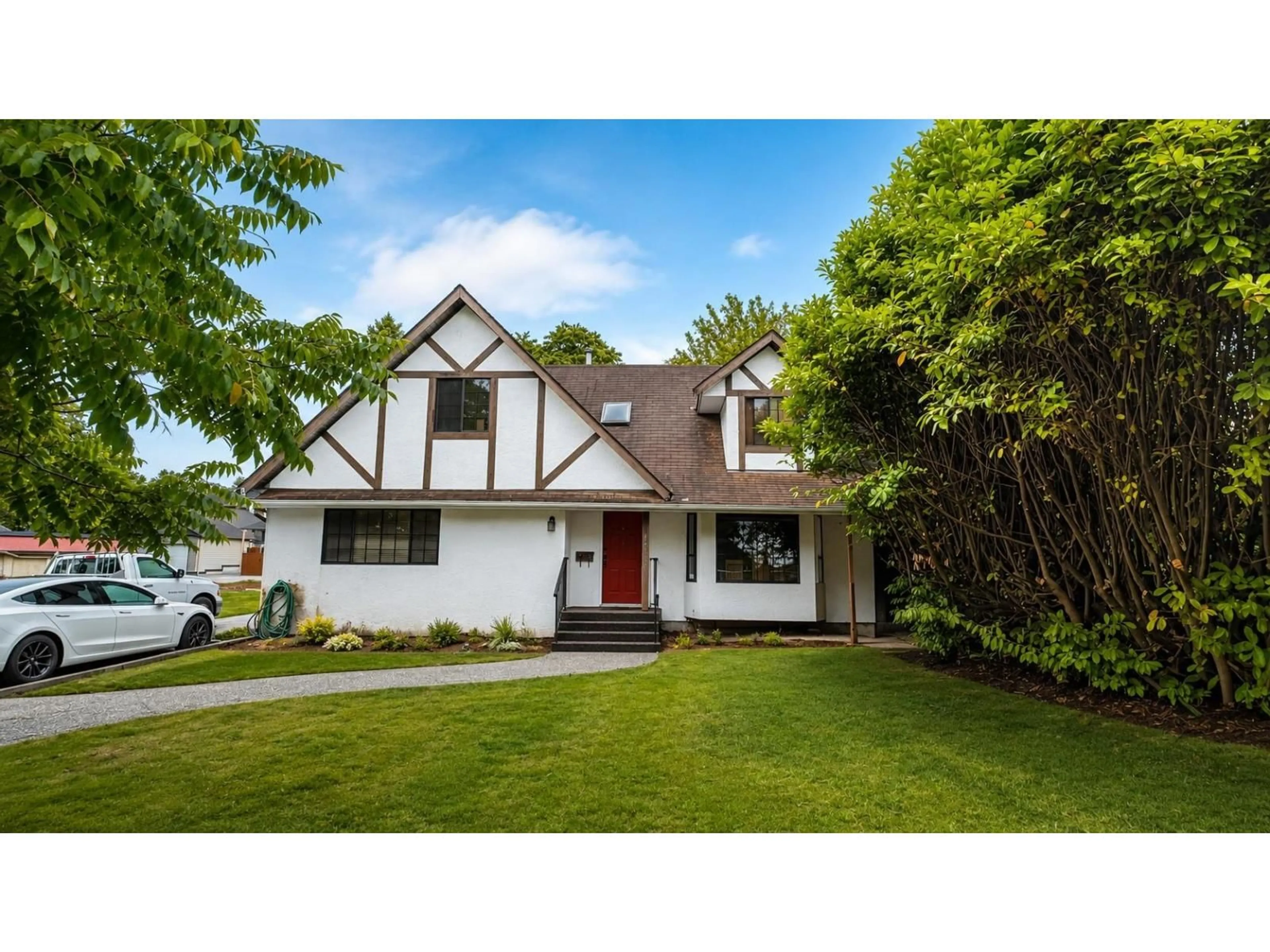 Home with vinyl exterior material, street for 14720 60 AVENUE, Surrey British Columbia V3S1R7