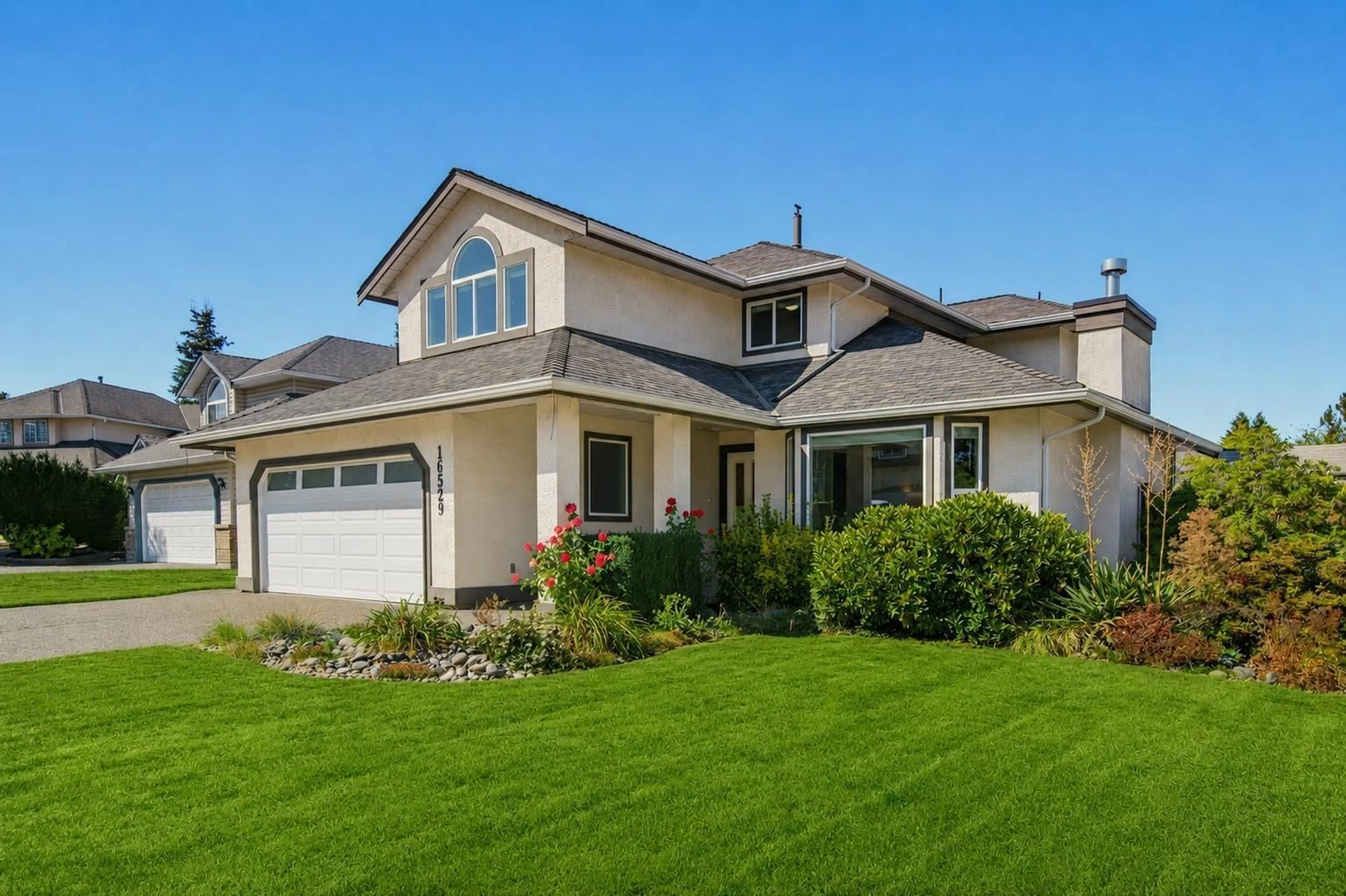 Home with vinyl exterior material, street for 16529 85 AVENUE, Surrey British Columbia V4N3H2