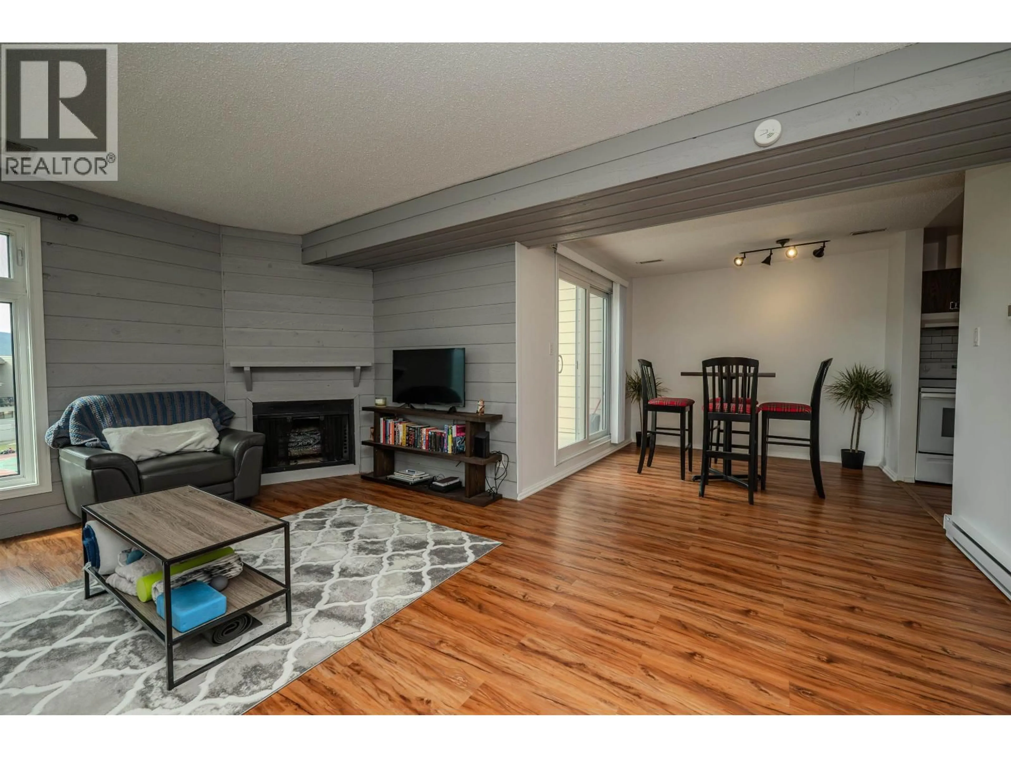 Living room with furniture, wood/laminate floor for 49 - 800 2ND AVENUE, Williams Lake British Columbia V2G4C4