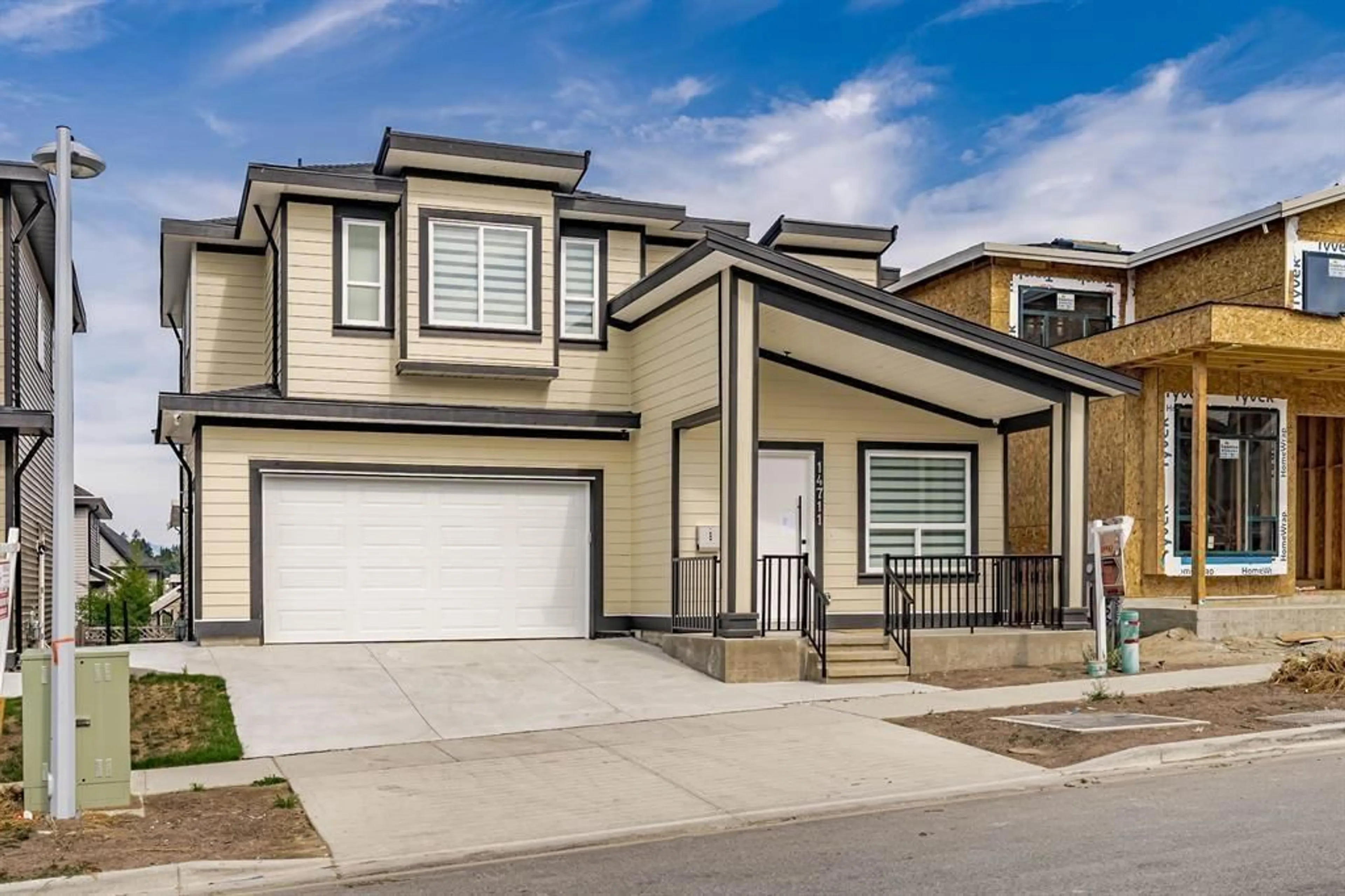 Home with vinyl exterior material, street for 14711 62A AVENUE, Surrey British Columbia V3S3T1