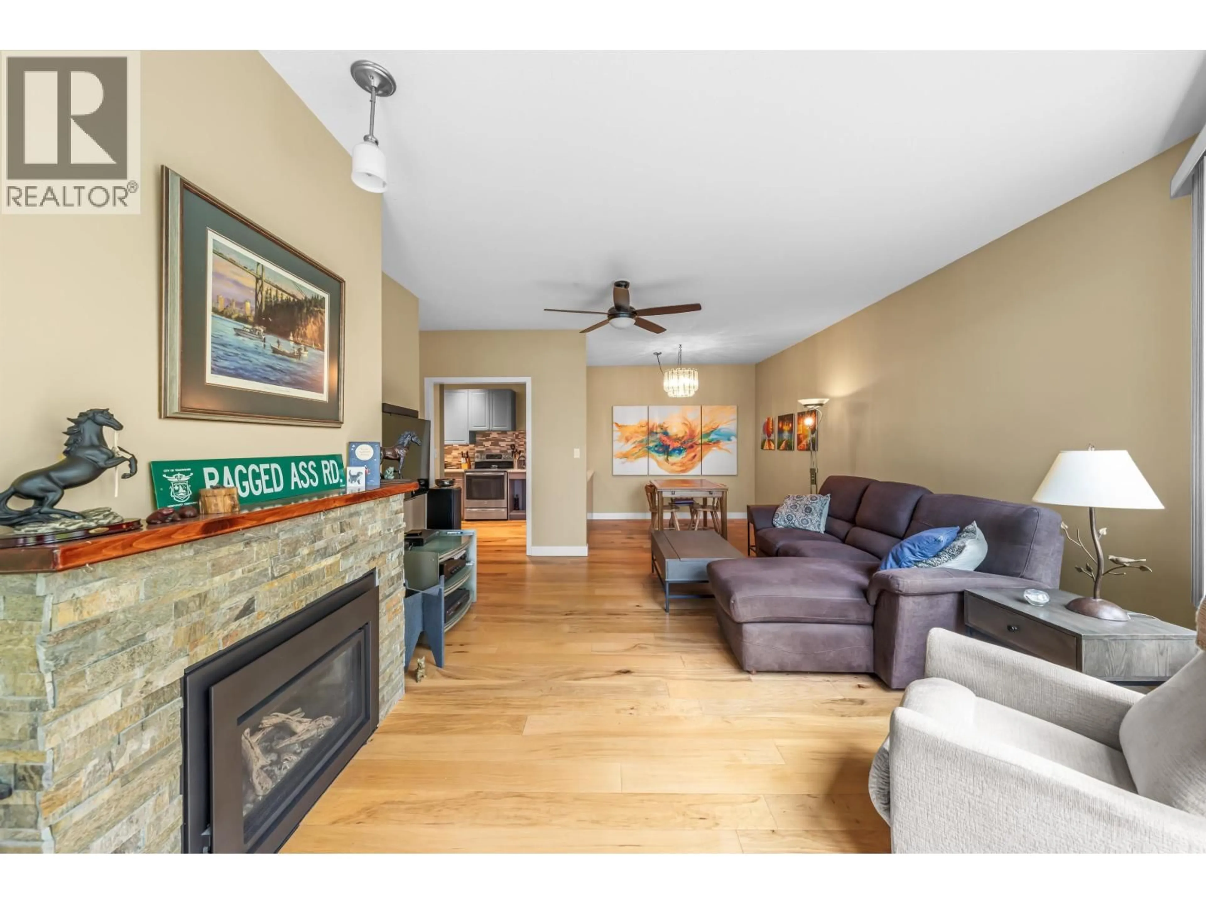 Living room with furniture, wood/laminate floor for 204 - 1150 QUAYSIDE DRIVE, New Westminster British Columbia V3M6E1