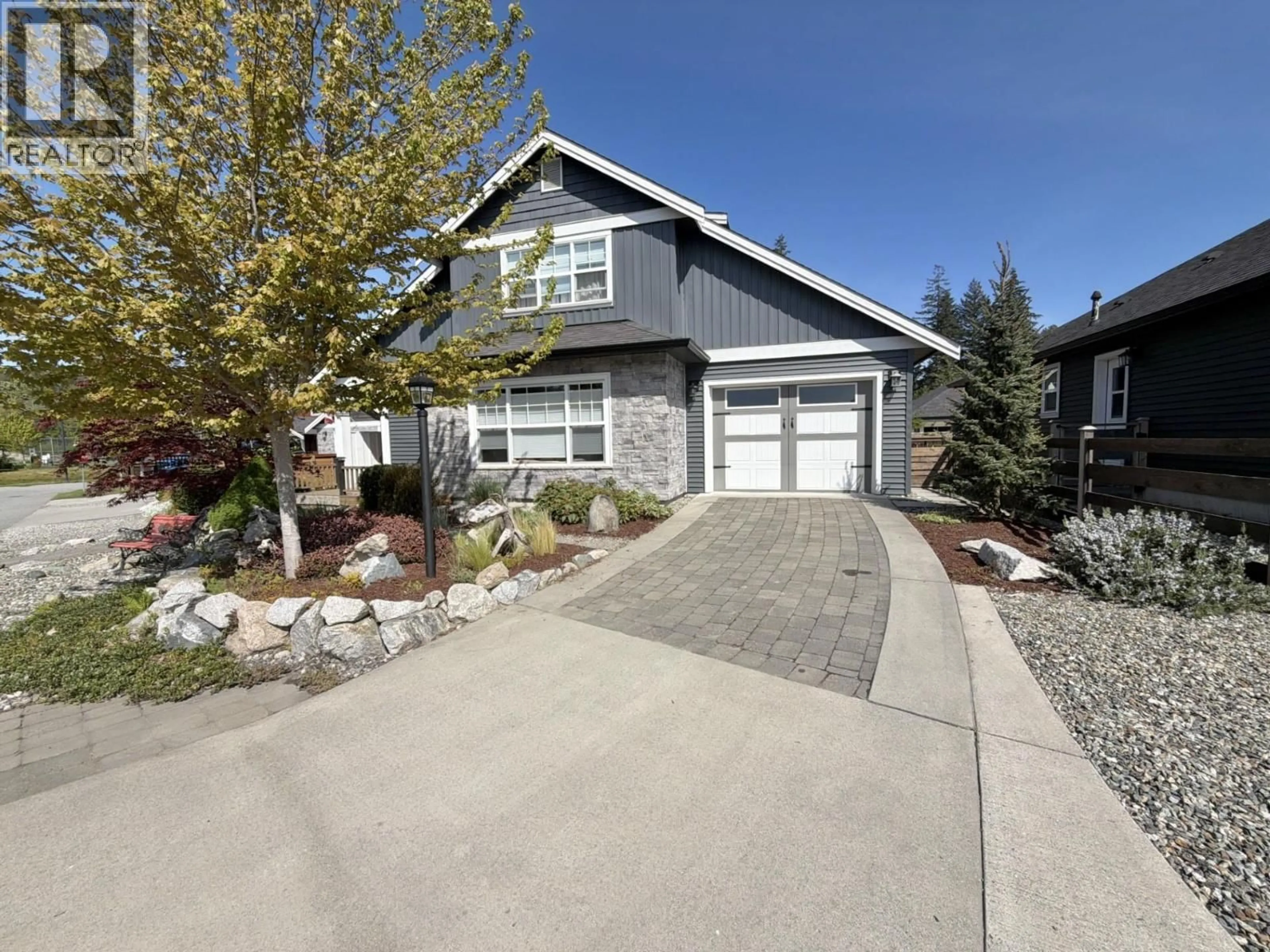Home with vinyl exterior material, street for 766 COOPER LANE, Gibsons British Columbia V0N1V7