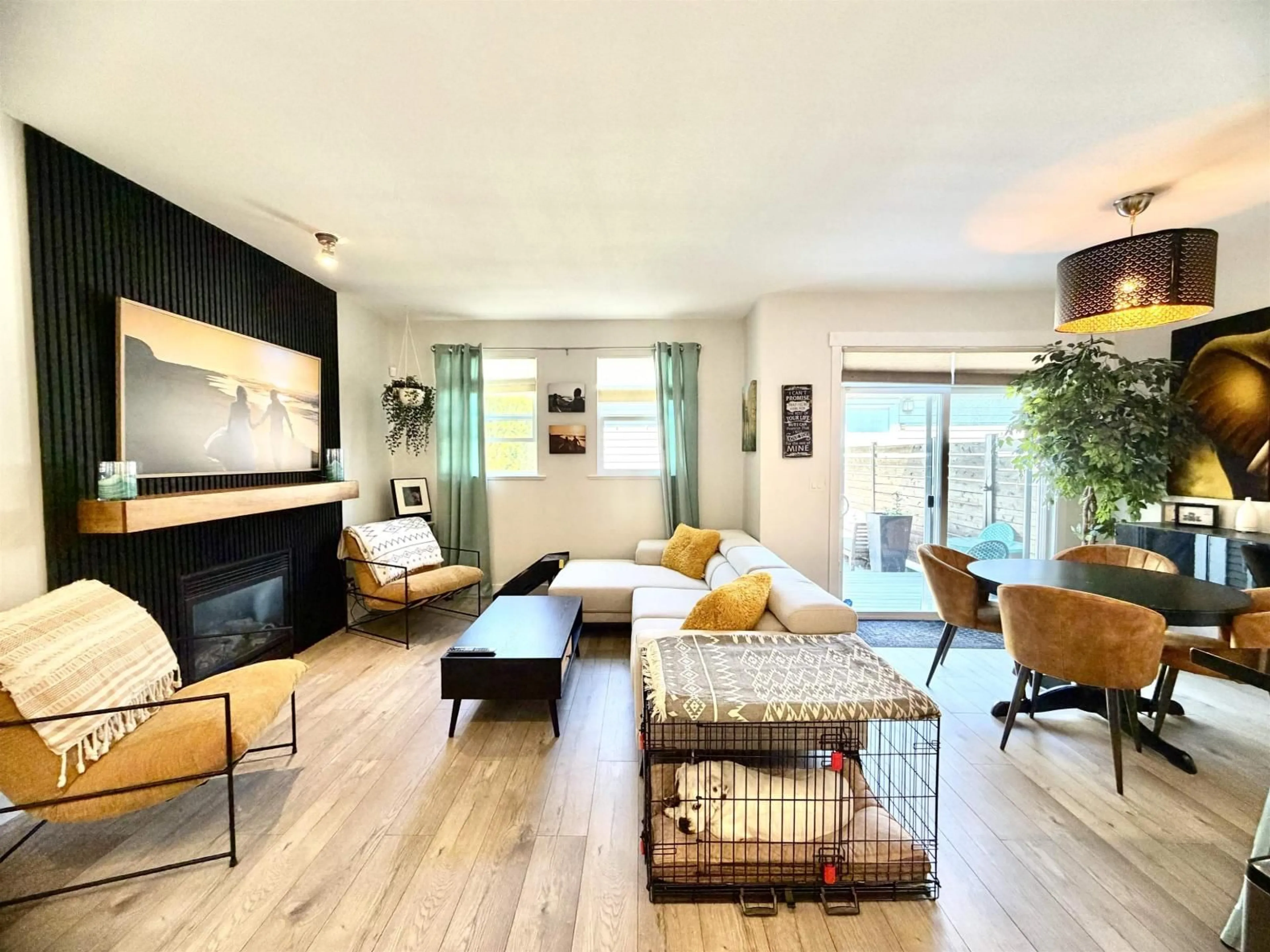 Living room with furniture, wood/laminate floor for 3 - 18011 70 AVENUE, Surrey British Columbia V3S6X3