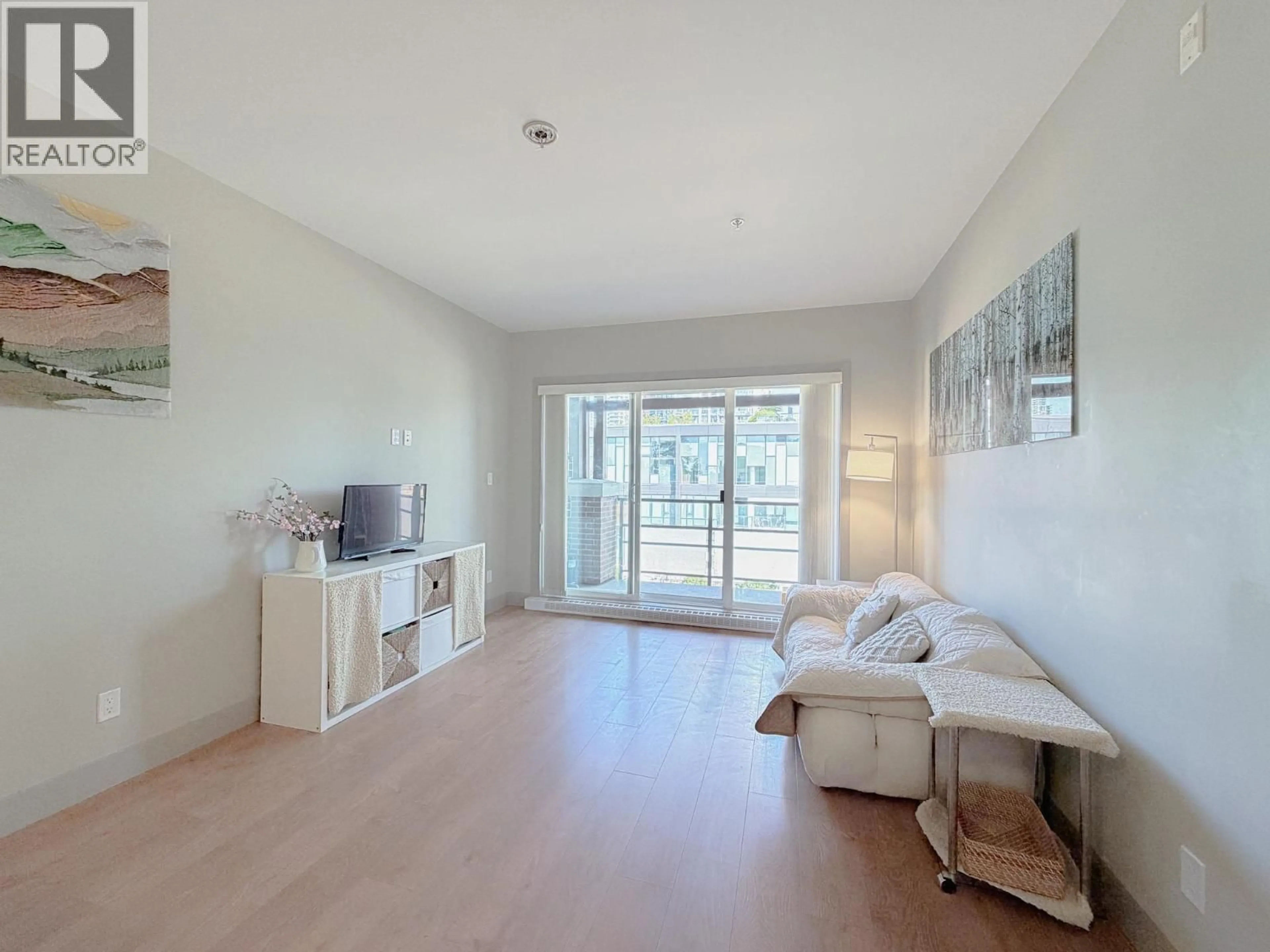 Living room with furniture, unknown for 305 - 6875 DUNBLANE AVENUE, Burnaby British Columbia V5J0G6