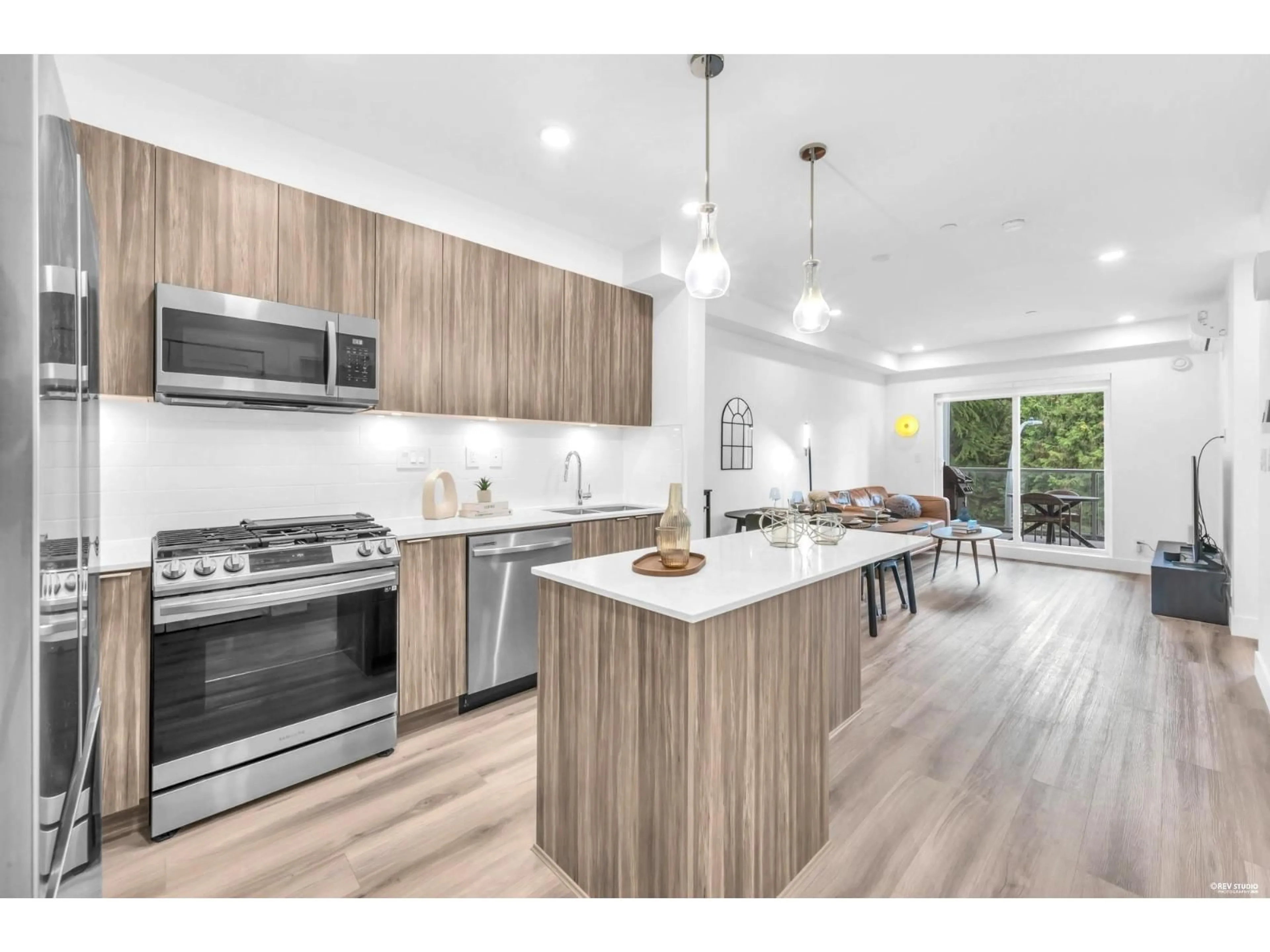 Open concept kitchen, wood/laminate floor for A310 - 8447 202 STREET, Langley British Columbia V2Y4K2