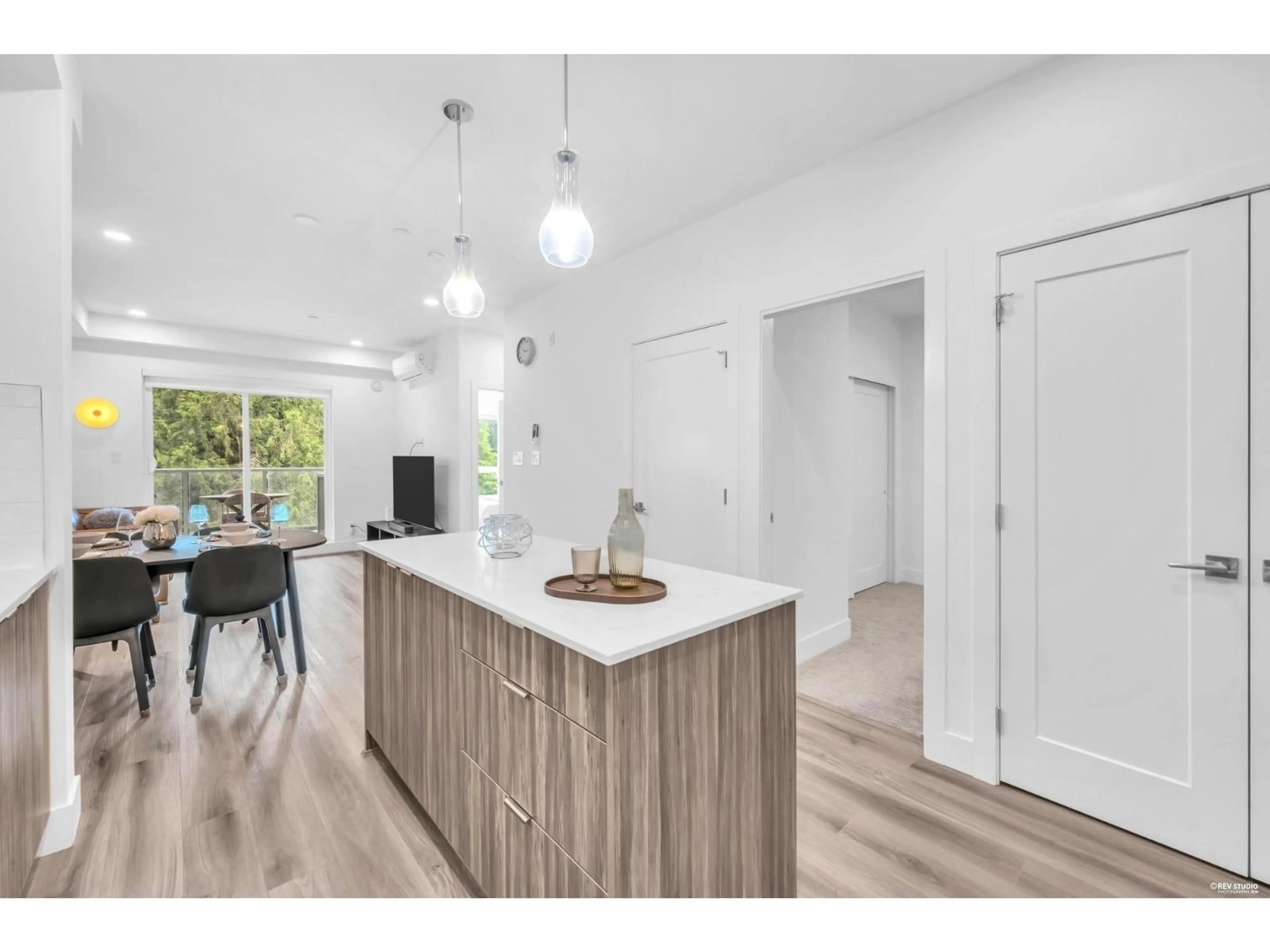 Open concept kitchen, wood/laminate floor for A310 - 8447 202 STREET, Langley British Columbia V2Y4K2