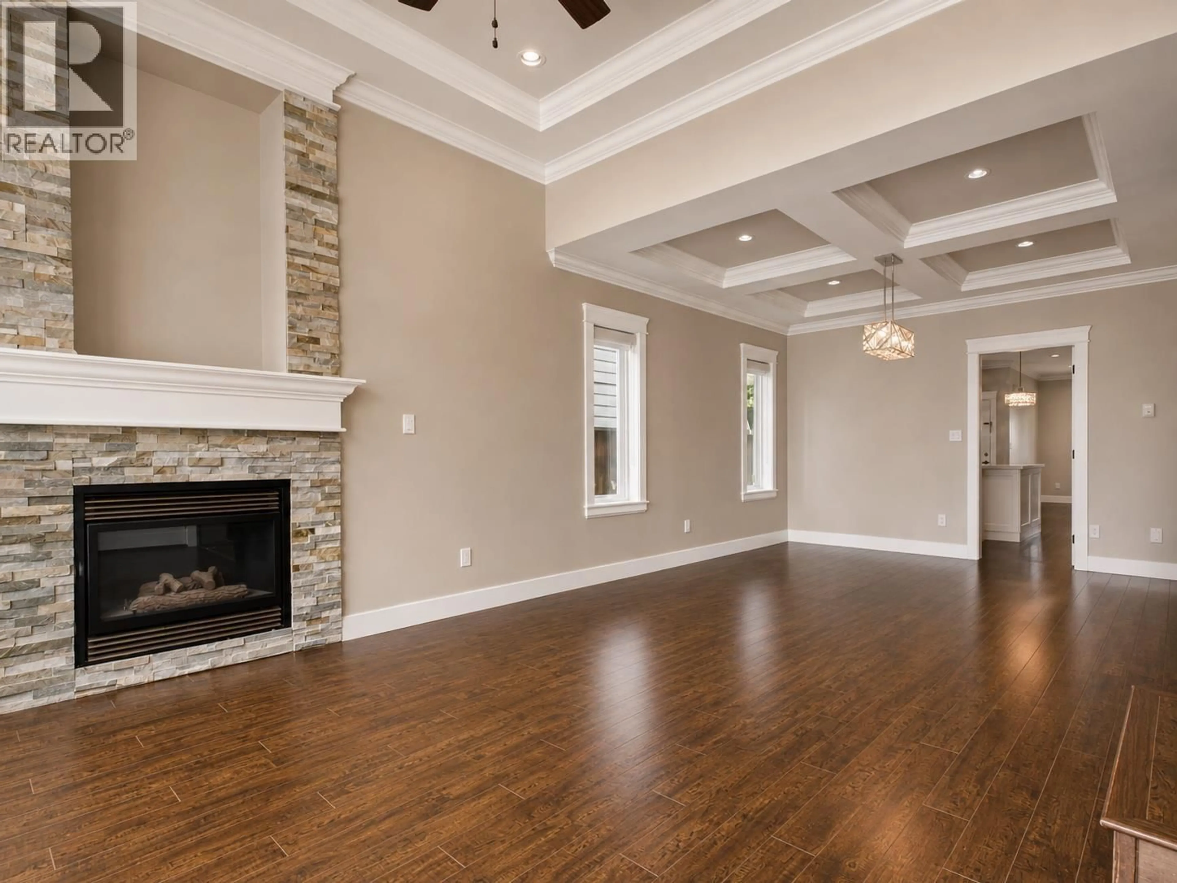 Living room with furniture, wood/laminate floor for 7553 NEWCOMBE STREET, Burnaby British Columbia V3N3V7