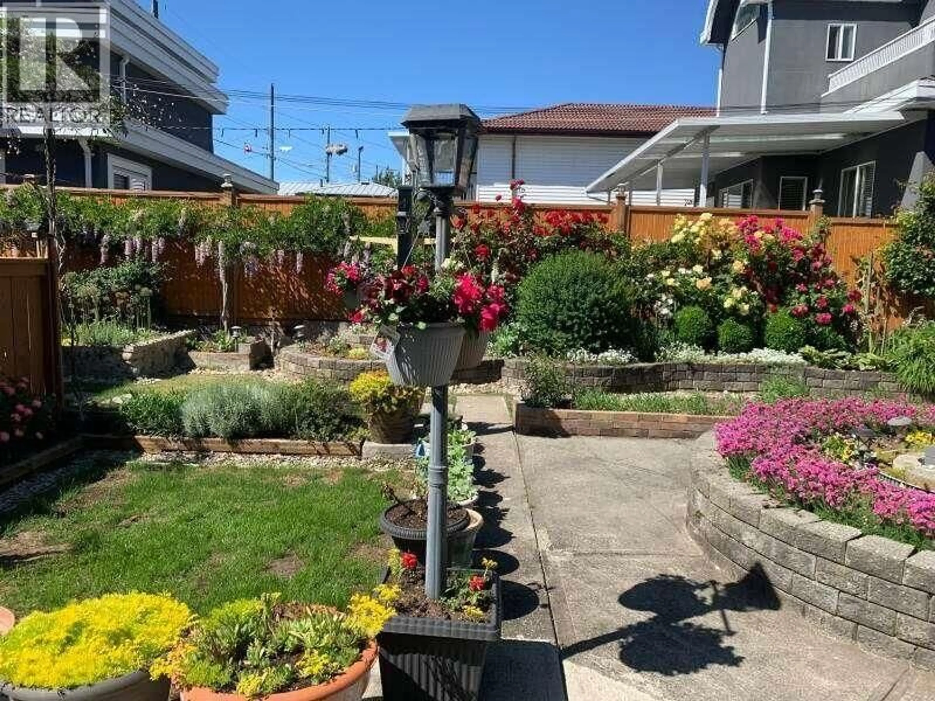 A pic from outside/outdoor area/front of a property/back of a property/a pic from drone, street for 7495 CULLODEN STREET, Vancouver British Columbia V5X4K3