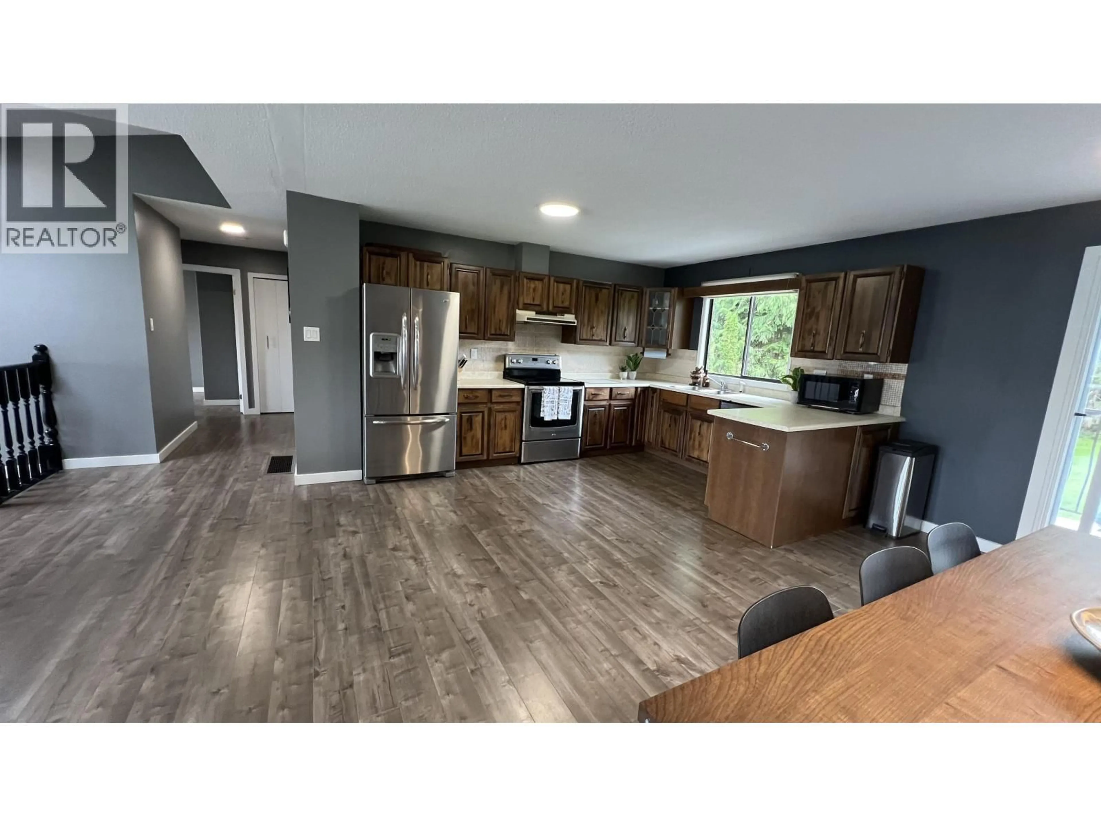 Open concept kitchen, wood/laminate floor for 116 RAVEN PLACE, Prince Rupert British Columbia V8J4E5