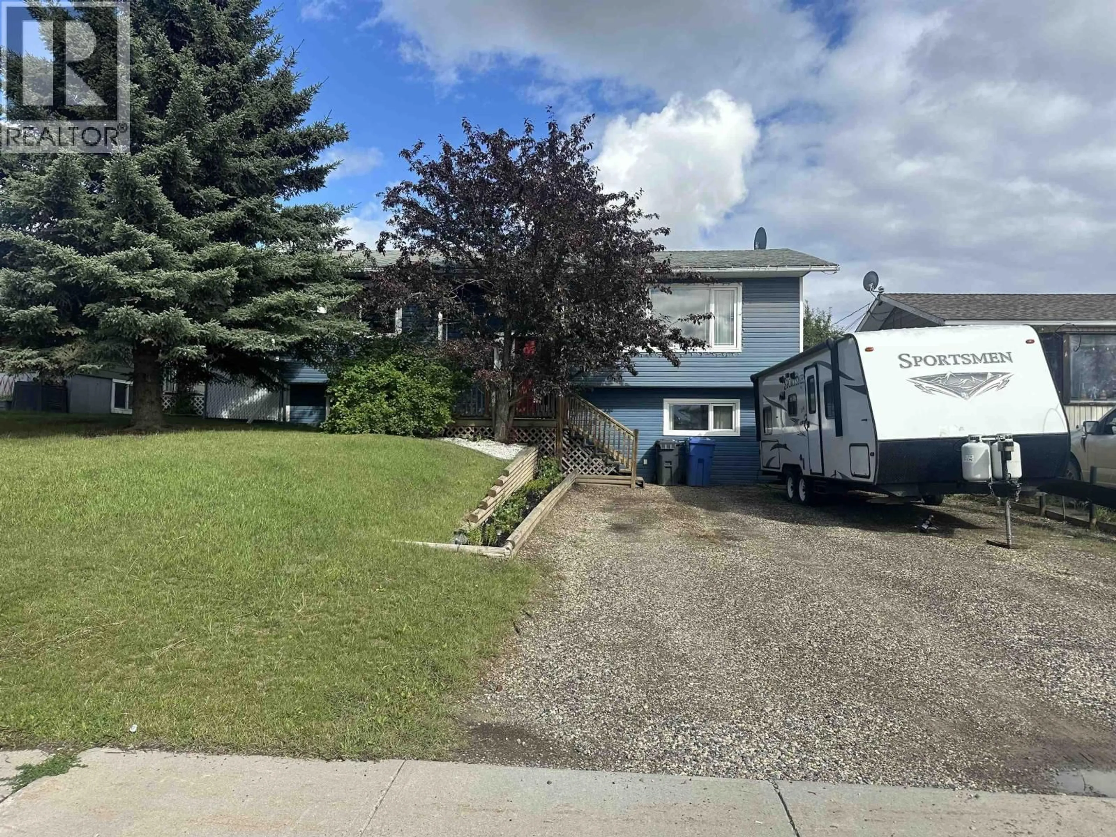 A pic from outside/outdoor area/front of a property/back of a property/a pic from drone, street for 8611 90 STREET, Fort St. John British Columbia V1J4R5