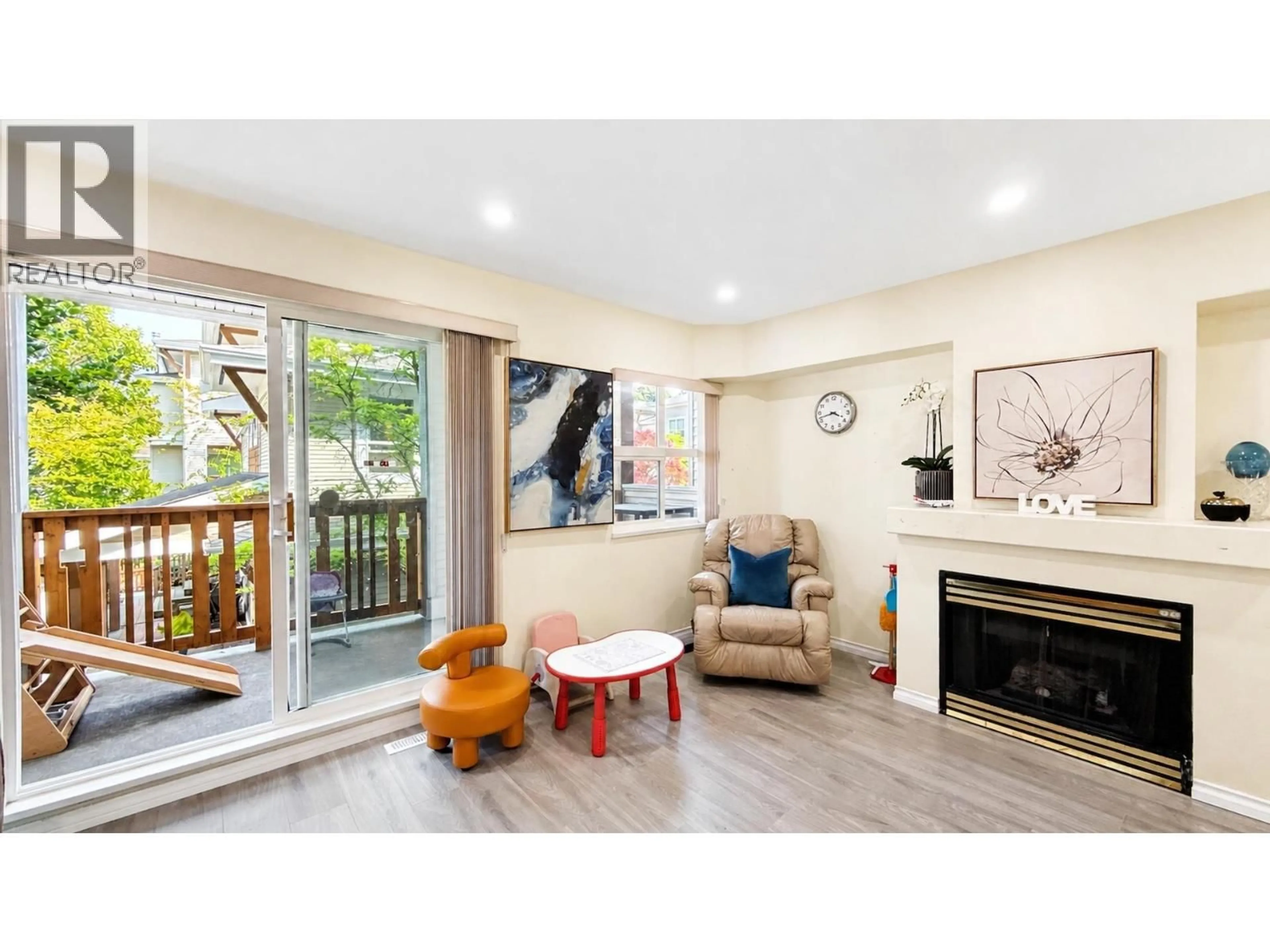 Living room with furniture, wood/laminate floor for 51 - 7111 LYNNWOOD DRIVE, Richmond British Columbia V7C5S9