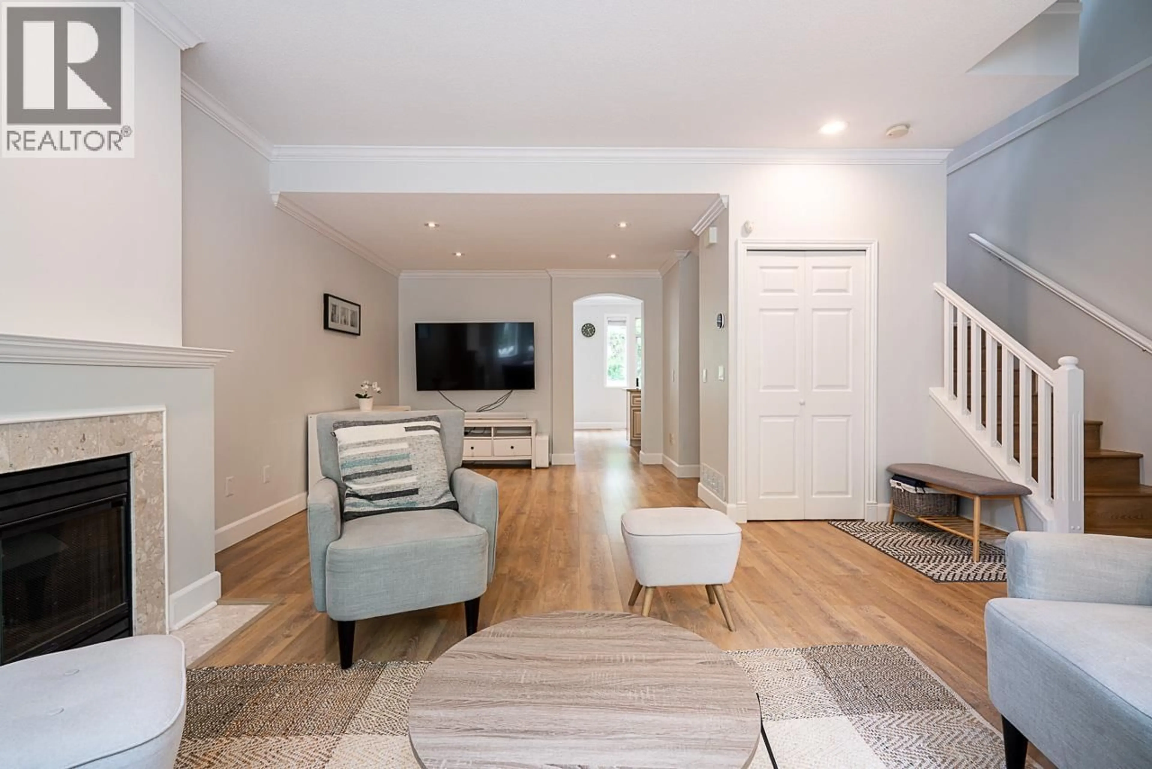 Living room with furniture, wood/laminate floor for 29 - 7501 CUMBERLAND STREET, Burnaby British Columbia V3N4Y6