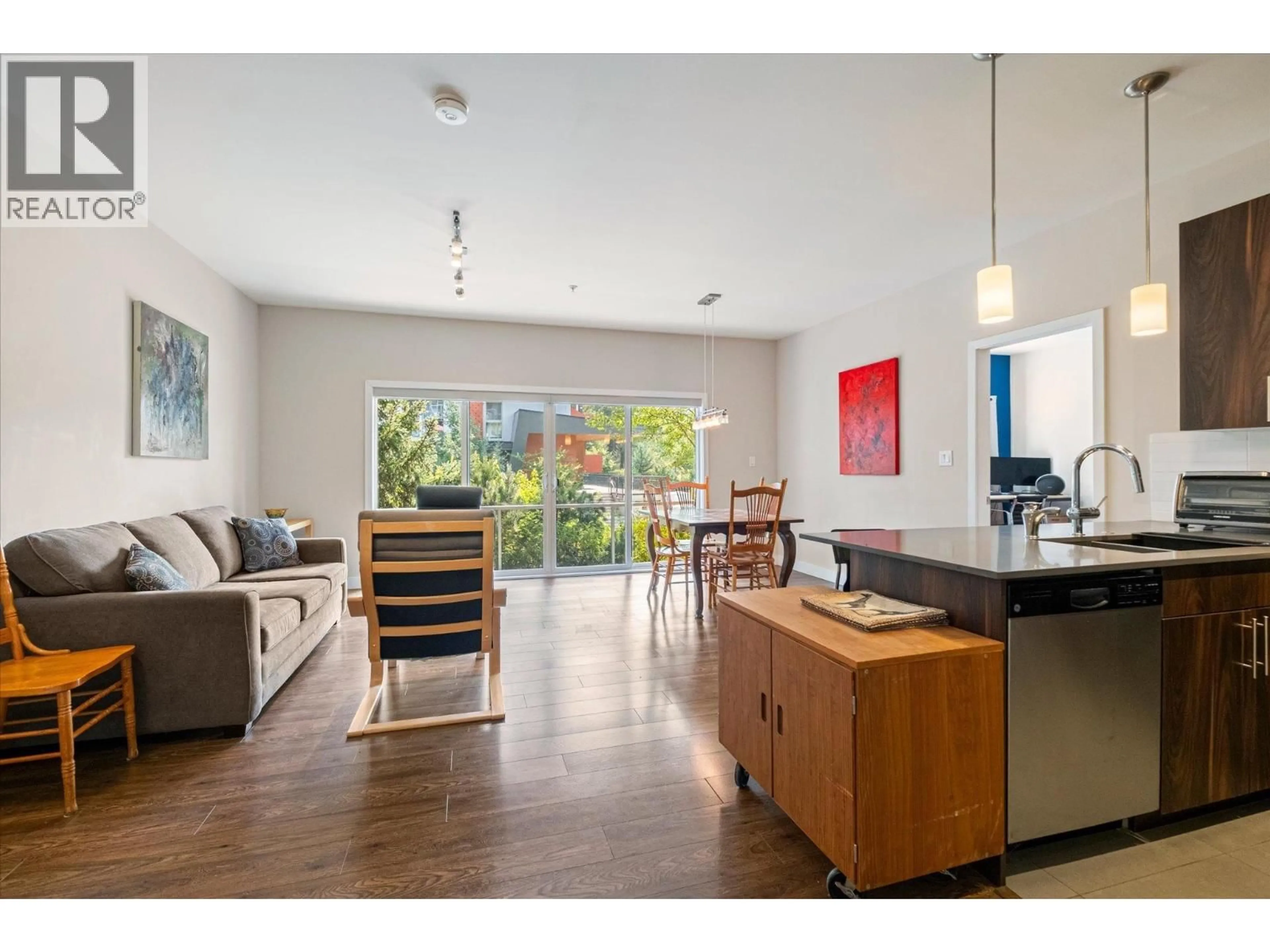 Open concept kitchen, wood/laminate floor for 110 - 1025 LEGACY WAY, Whistler British Columbia V8E0S2
