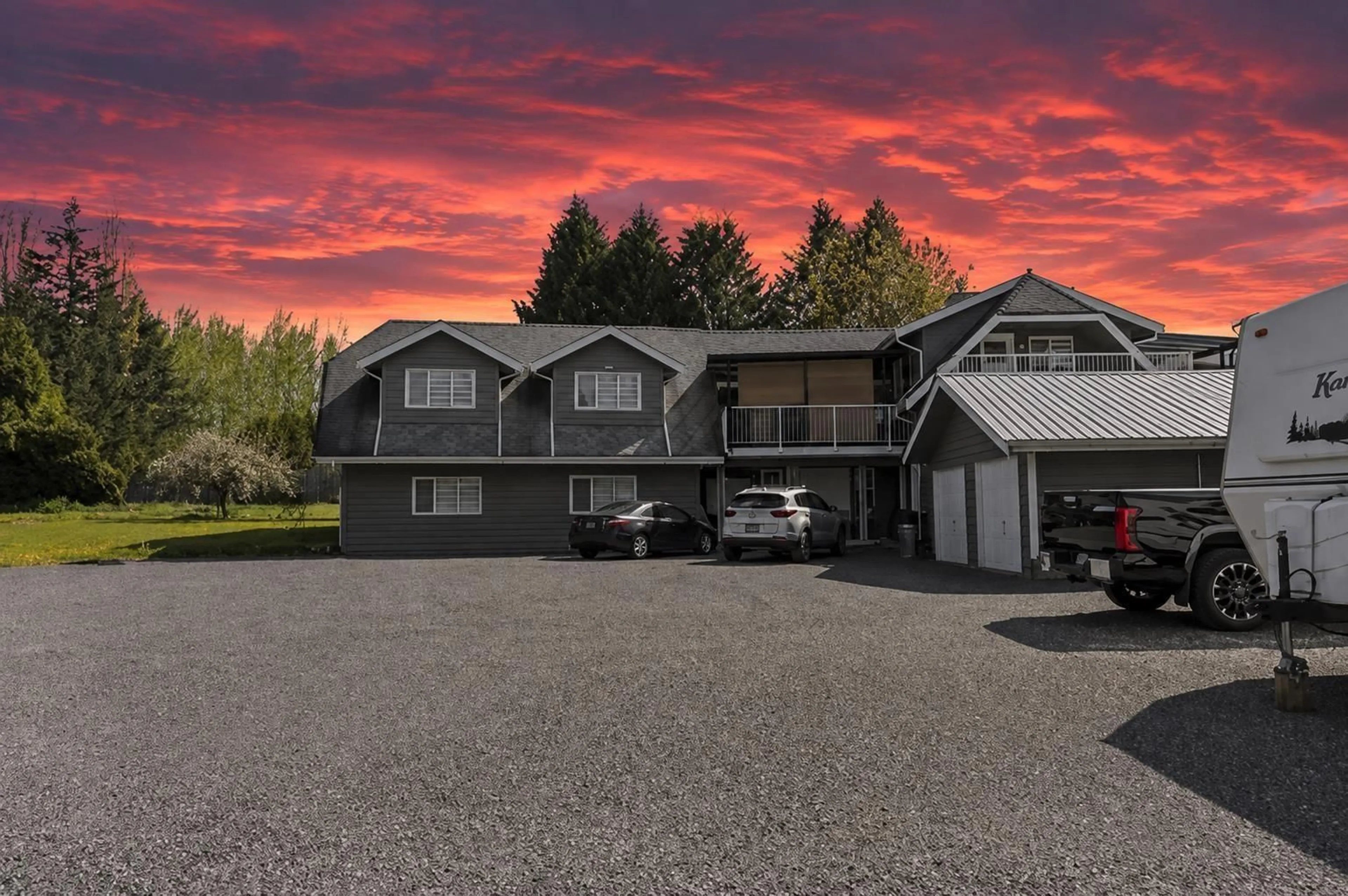A pic from outside/outdoor area/front of a property/back of a property/a pic from drone, street for 25412 58 AVENUE, Langley British Columbia V4W1G7